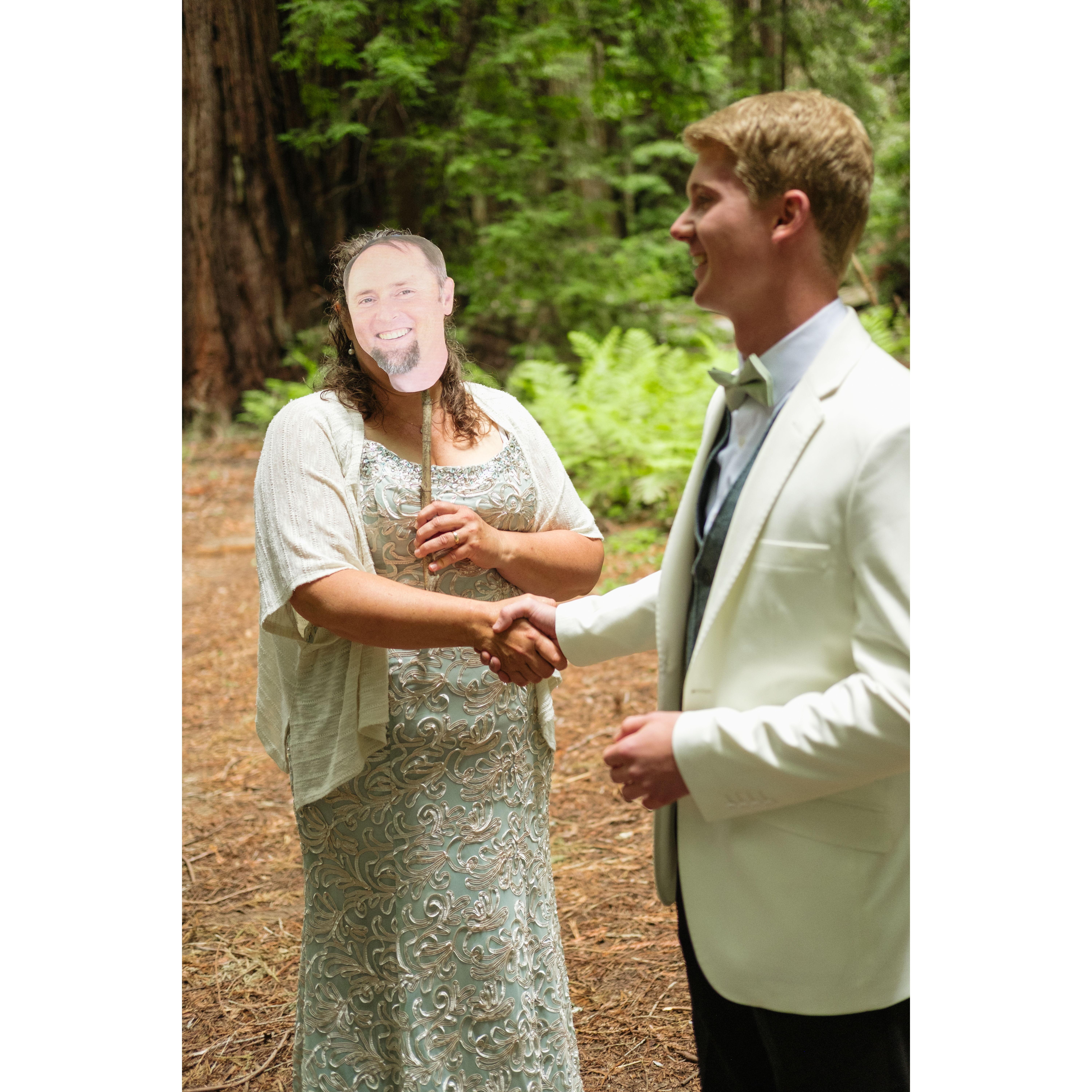 Matt was in the hospital with a brain bleed so Julie made a little cut-out of his face to come to the wedding so it would be a bit more like he was there <3