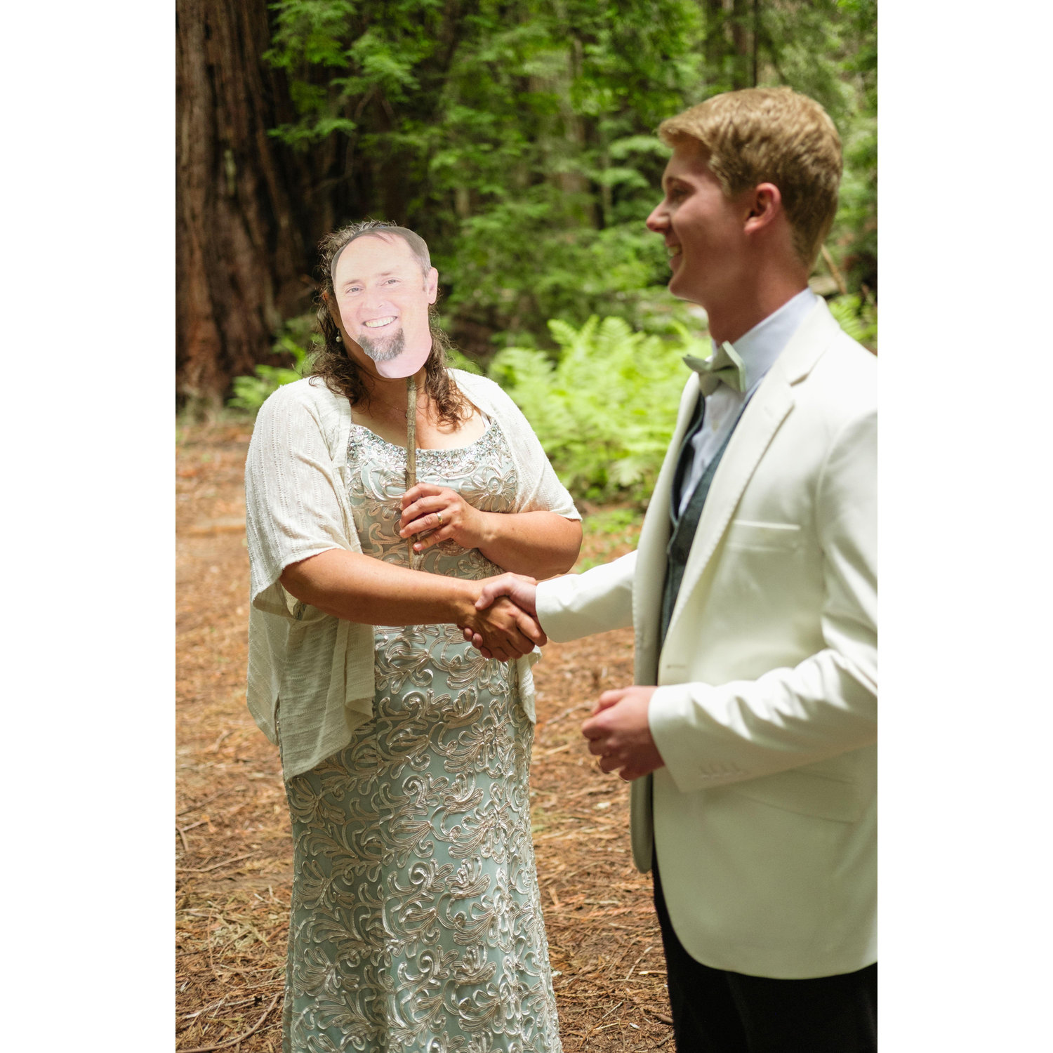 Matt was in the hospital with a brain bleed so Julie made a little cut-out of his face to come to the wedding so it would be a bit more like he was there <3