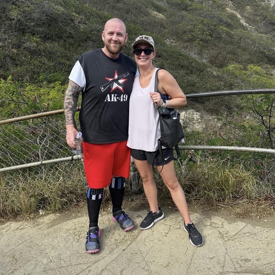 Matt and Sydney climbing Diamond Head in Hawaii.