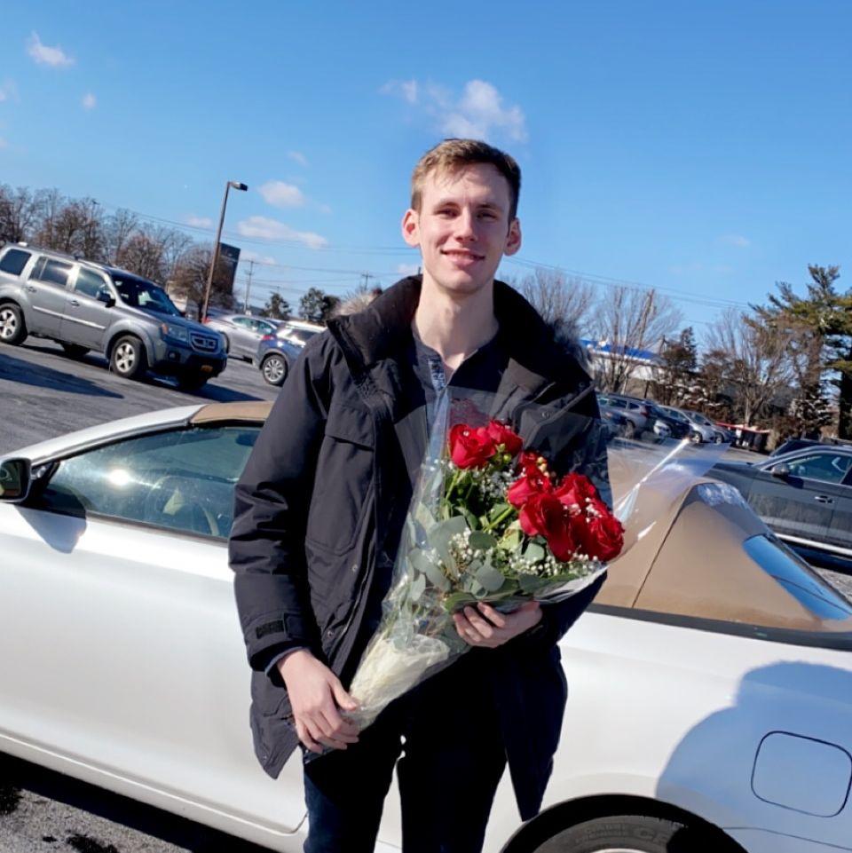 And, he surprised her right back by bringing flowers to work for Valentine's Day.