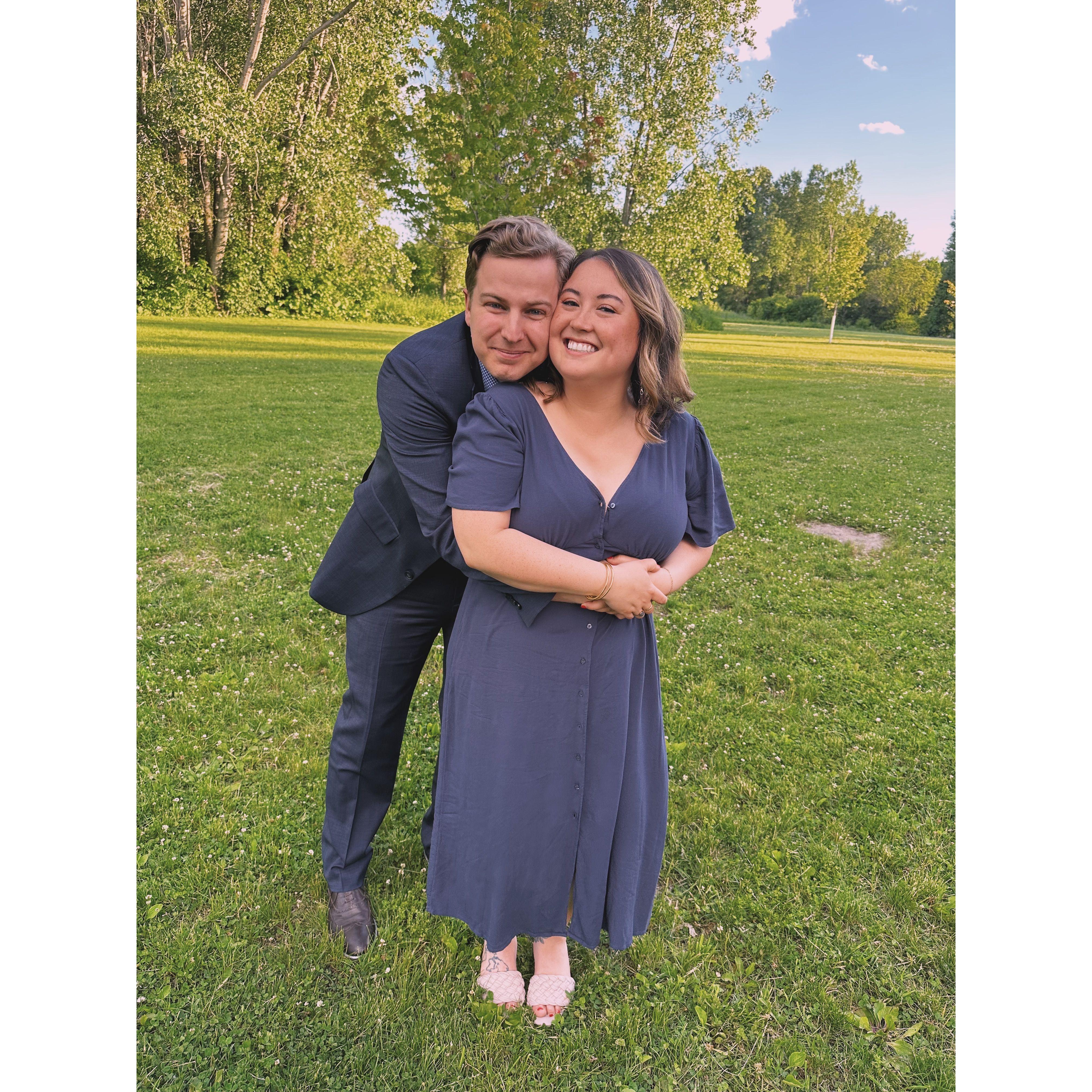 Our first official photo together at a friend's wedding.