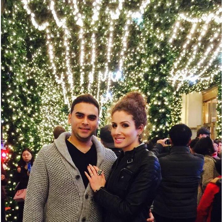 First Christmas engaged in front of the beautifully decorated Lord & Taylor on 5th Ave.