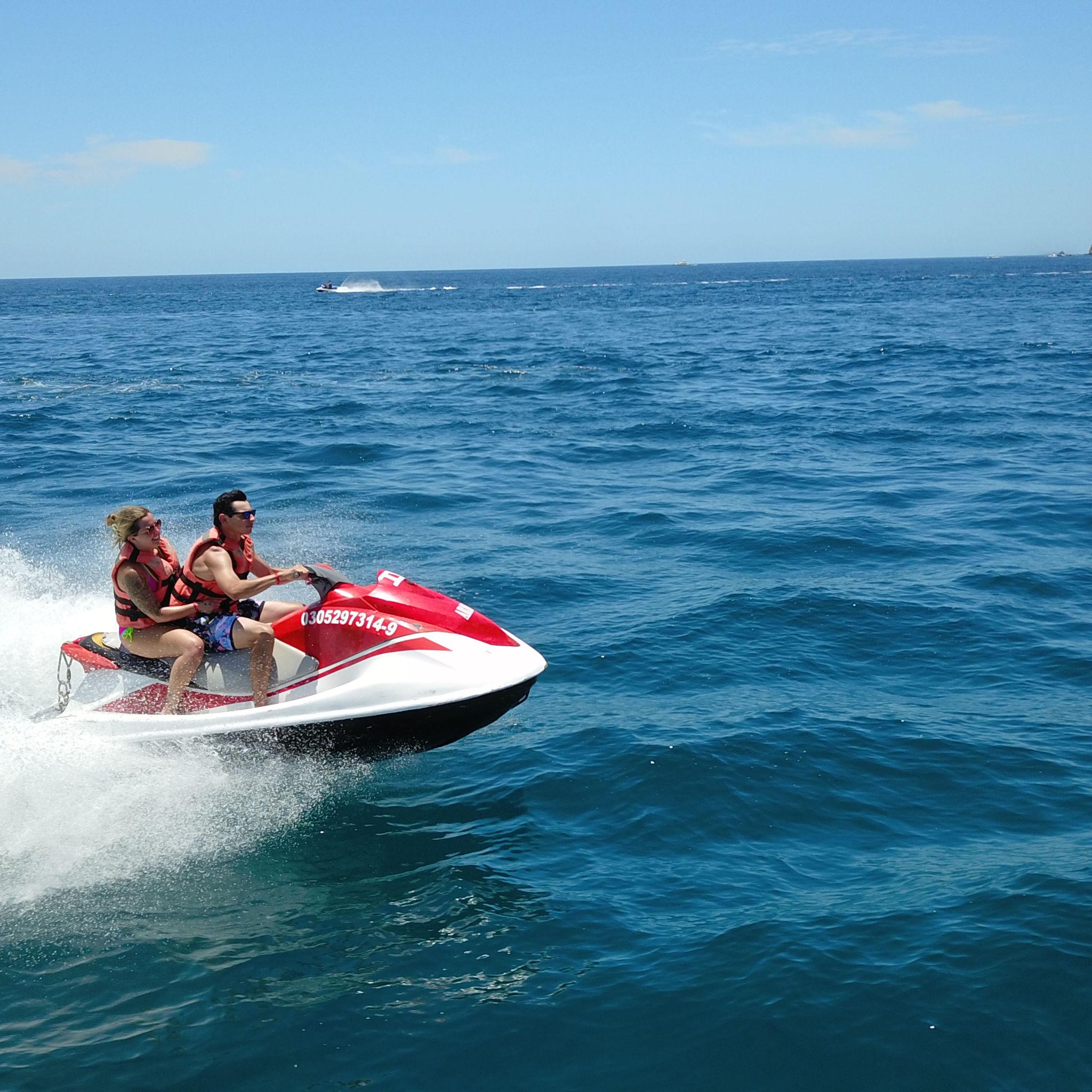 Riding a jet ski in the Pacific Ocean!