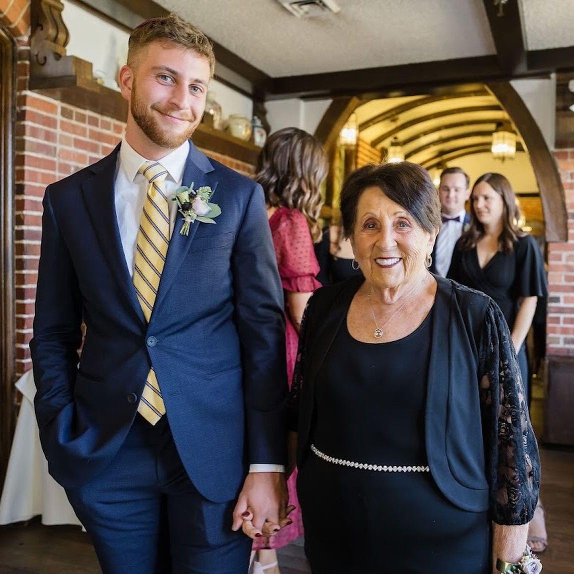Walking Nana down the aisle for Micayla and John's wedding.