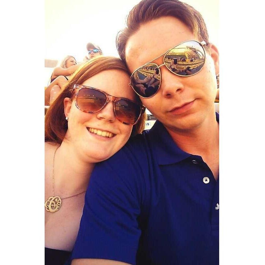 I love LSU; it's my alma mater after all. So I buy Nathan LSU shirts and drag him to games every once in a while.