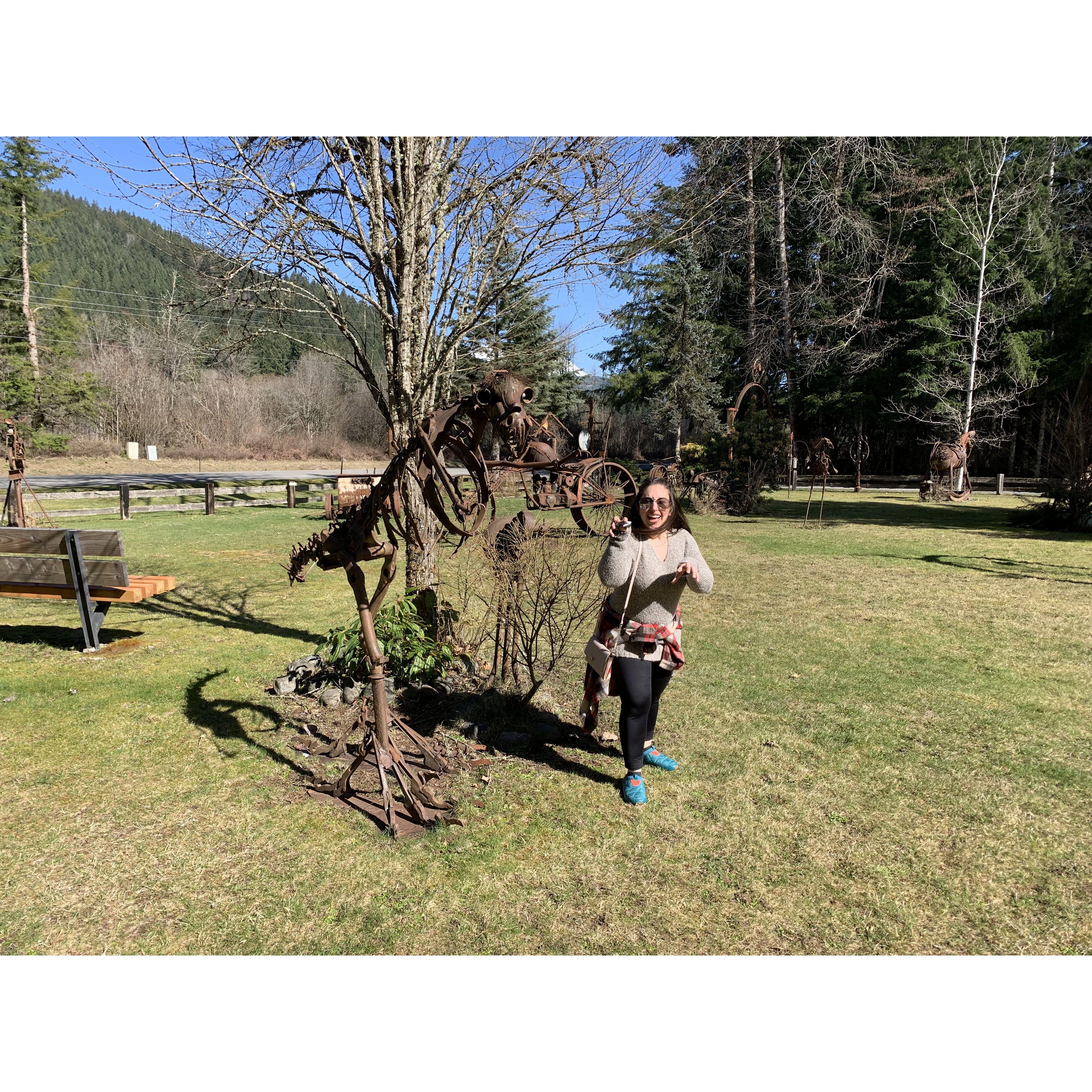 Sylvana posing in a cool outdoor metal sculpture park in Ashford, WA