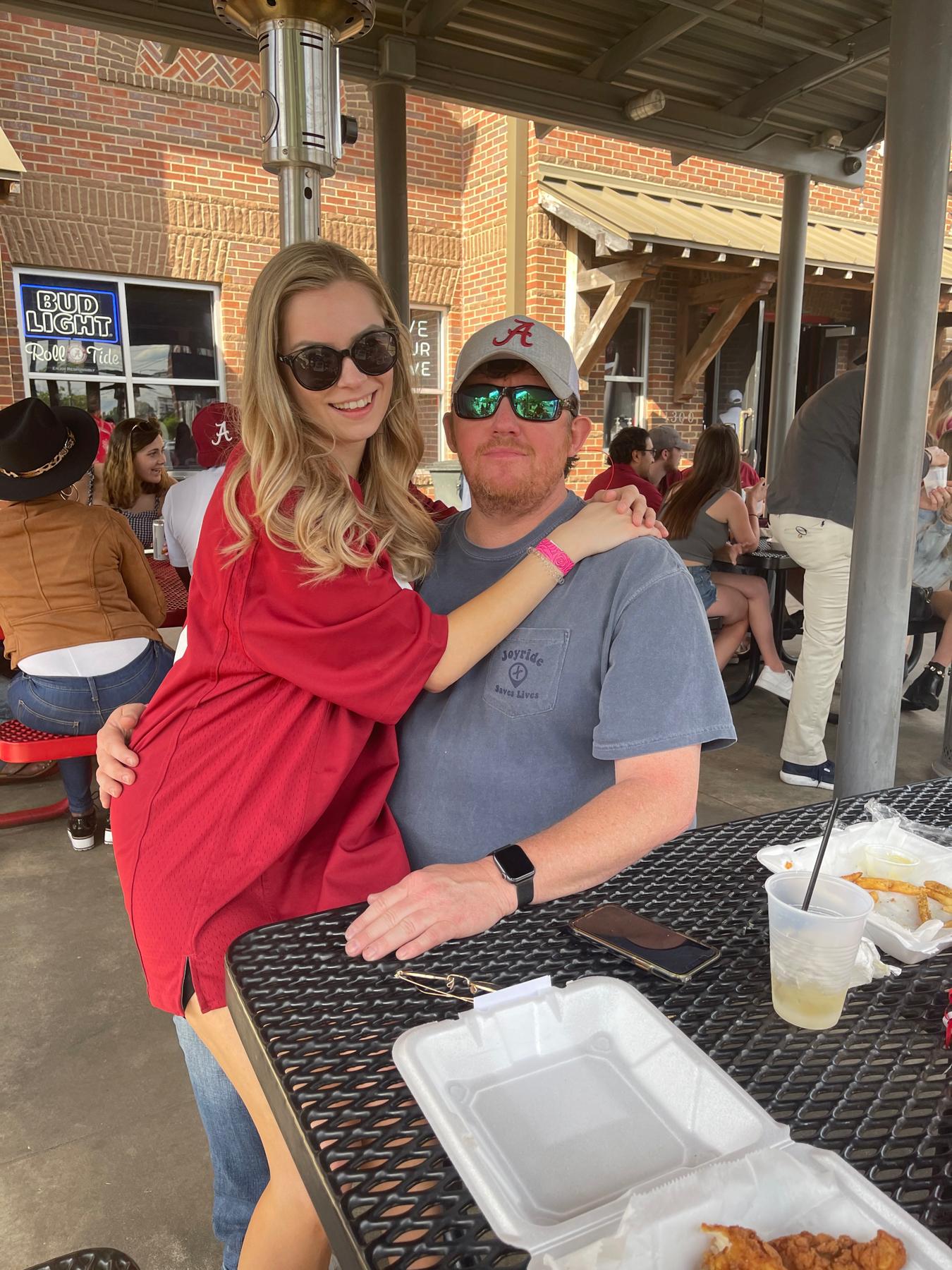 Our first picture together. We're sitting on the patio of Houndstooth in Tuscaloosa, where we first met.