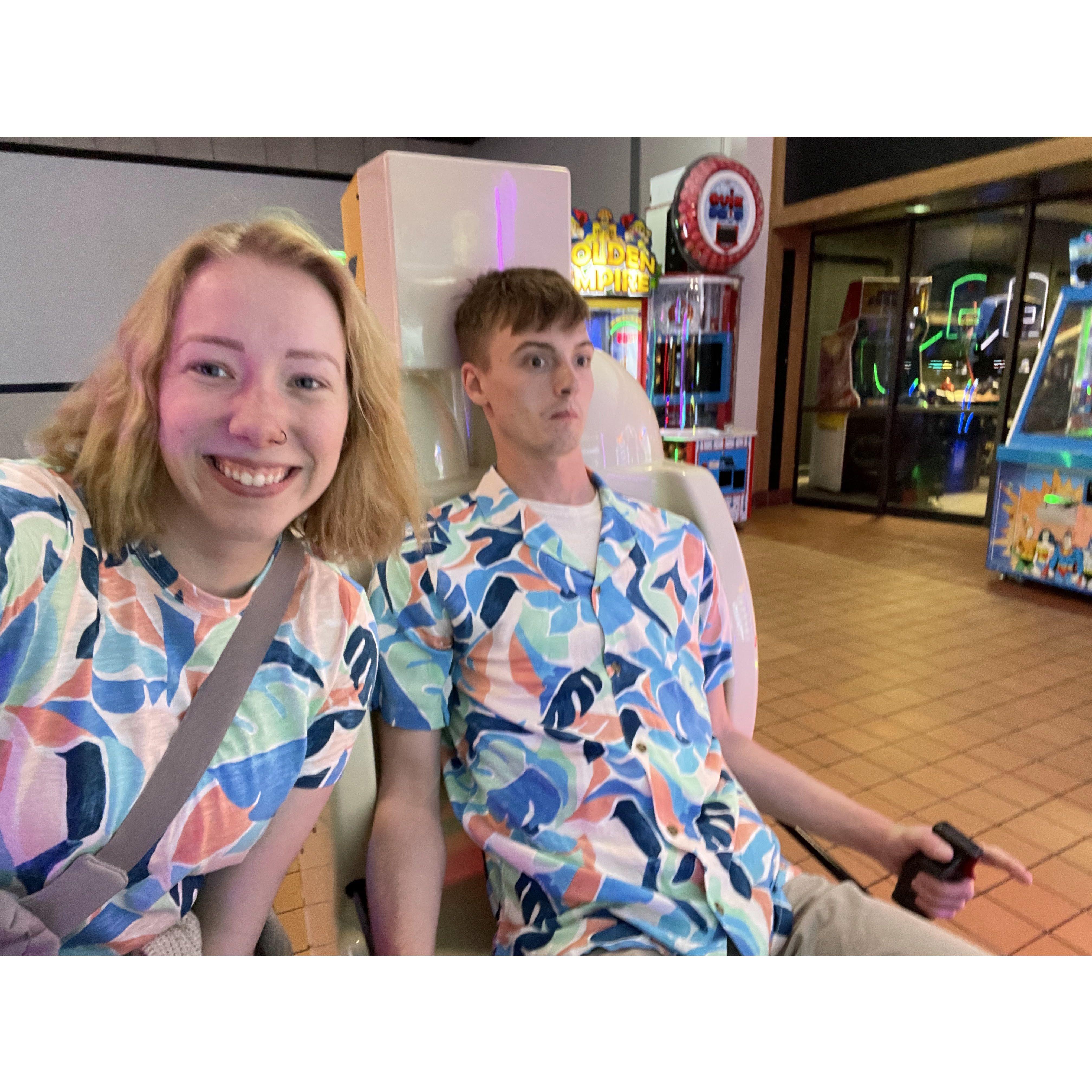 Our first date after moving in together in May 2023! I bought us matching shirts, and we played video games. My brothers sent Randy messages telling him to blink if he was being held against his will.