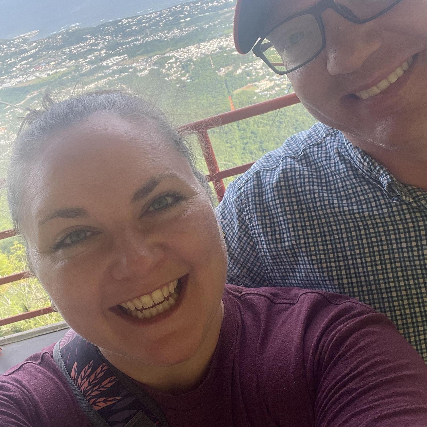On top of Mount Isabel de Torres in the Dominican Republic (this was as close to the edge of the platform that Laura could get Chris to stand for a picture)