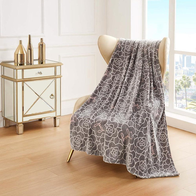 Juicy Couture - Throw Blanket | Flower Grid | Plush and Cozy | Decorative Blankets for Sofas, Chairs and Beds| Luxurious and Soft | Chic Home Decor | Measures 50" x 70" | Grey/Pink