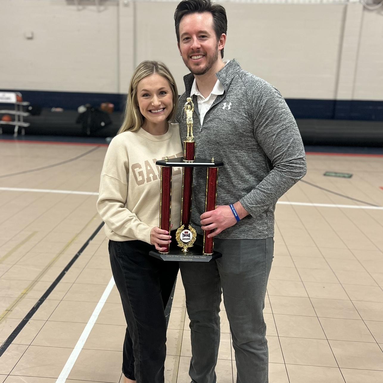 What a team! Kendall coaches varsity cheer for her 6th season. Jerry’s first year coaching varsity boys at Metro, and they won the championship in their division.