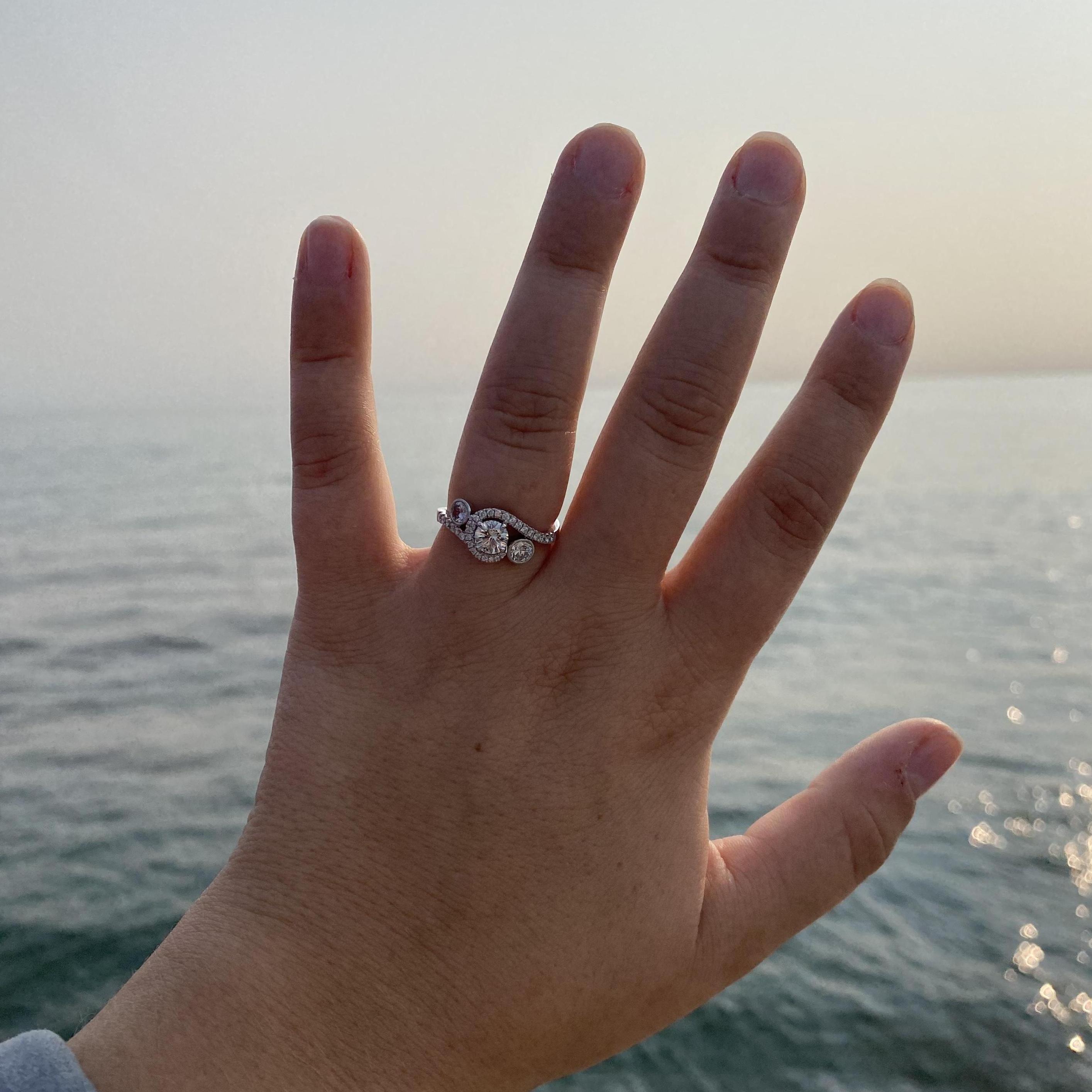 Admiring the beauty of this ring against the beautiful Lake Superior.