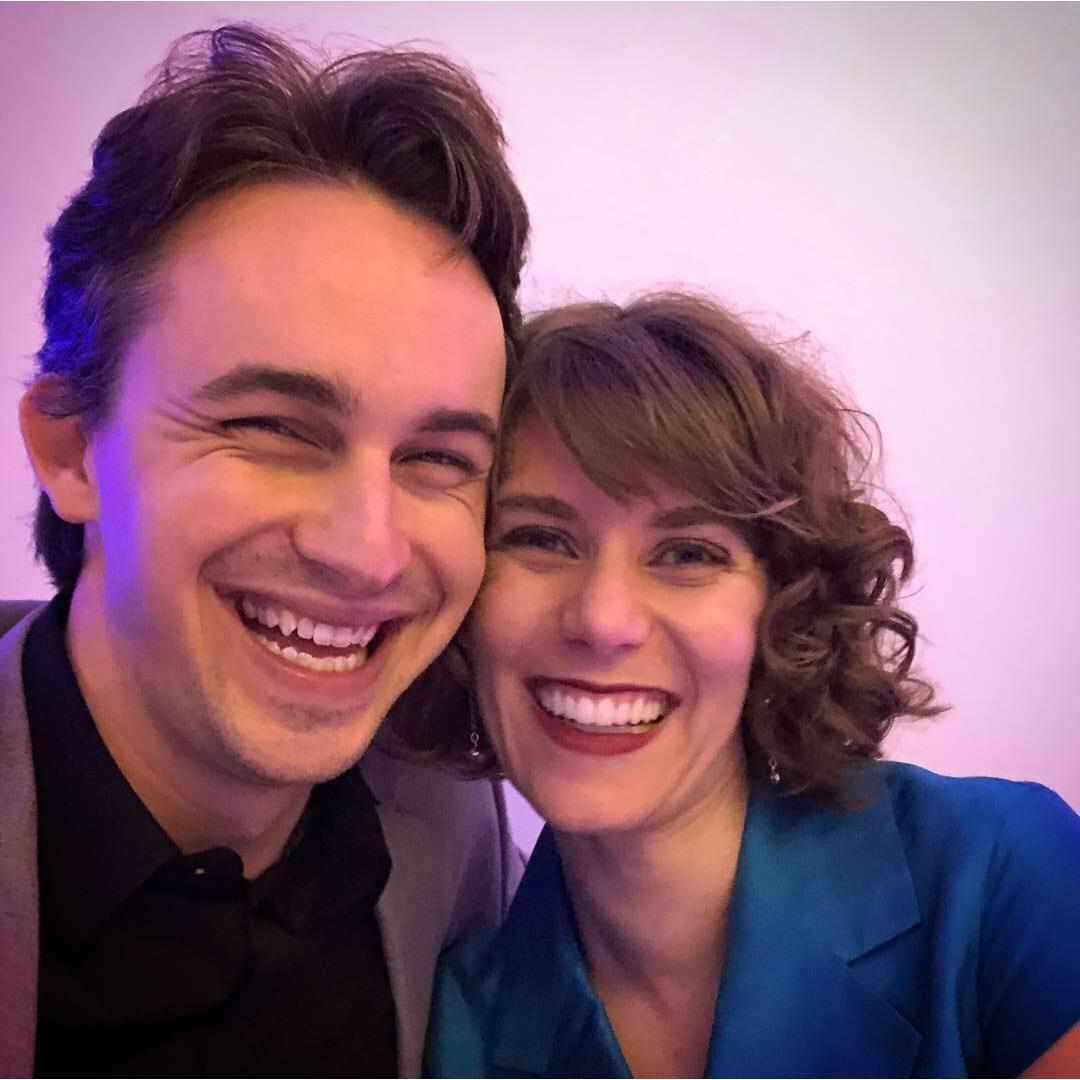 Cheesing for the camera at a holiday party.
