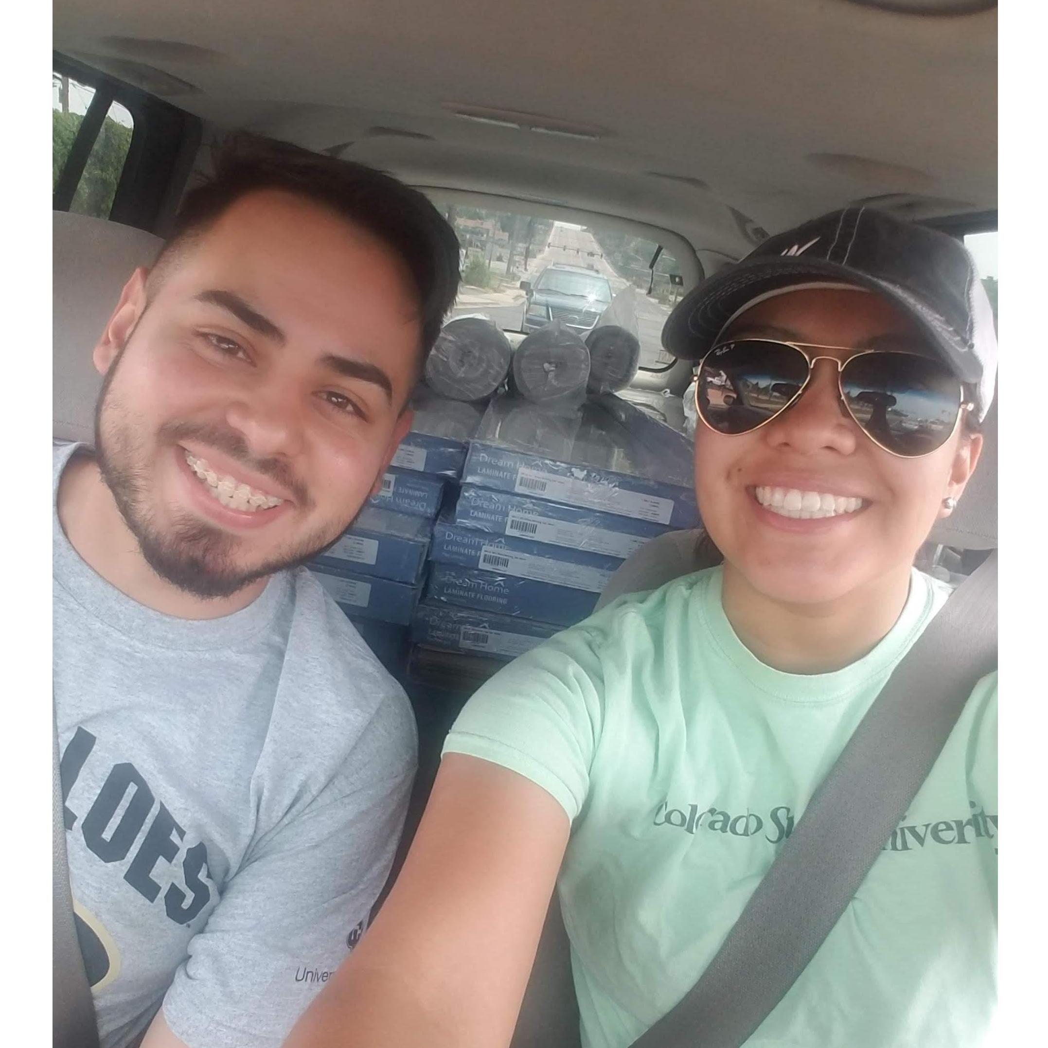 Home renovation! This is us (not knowing what we had signed up for) being very excited to pick up our flooring that WE put in ourselves into our condo!