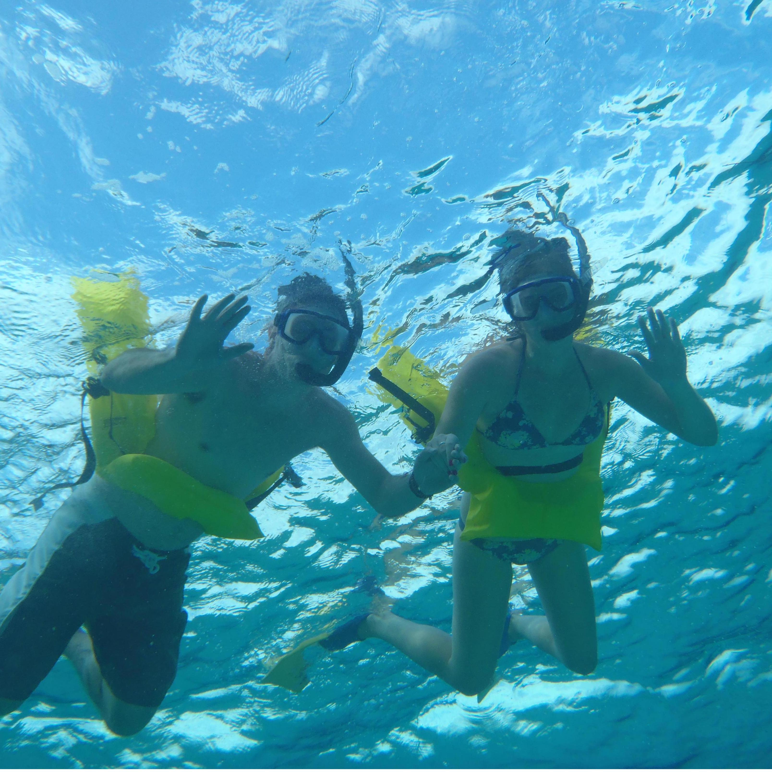 First time snorkeling! Josh got Chelsea to love swimming with fish! She still doesn't like nurse sharks though!