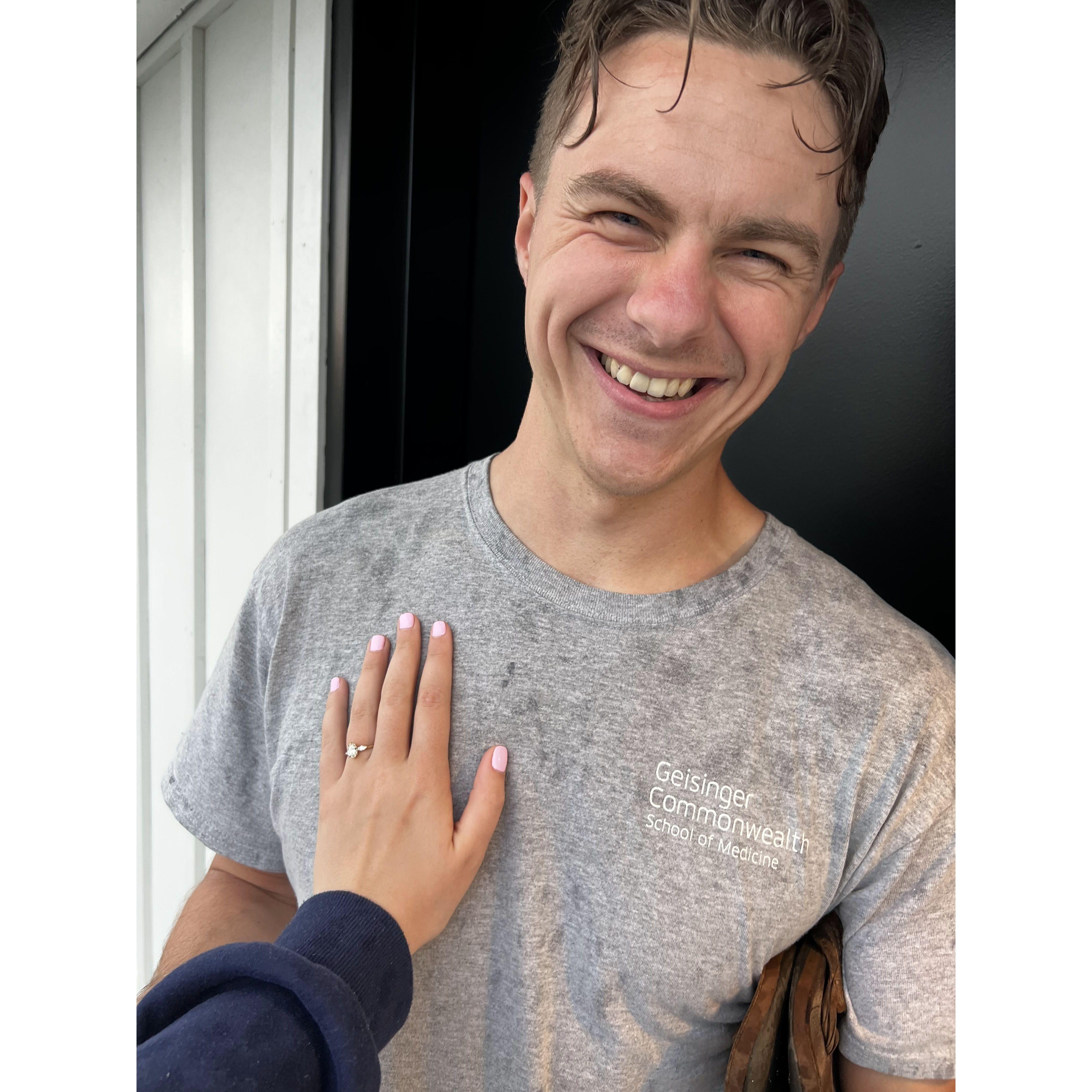 One of the first pictures we sent to family after saying yes in the rain!