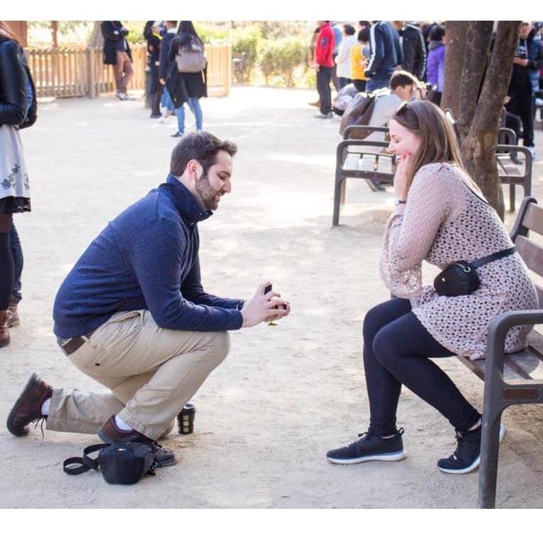Jake got down on his knee and proposed.