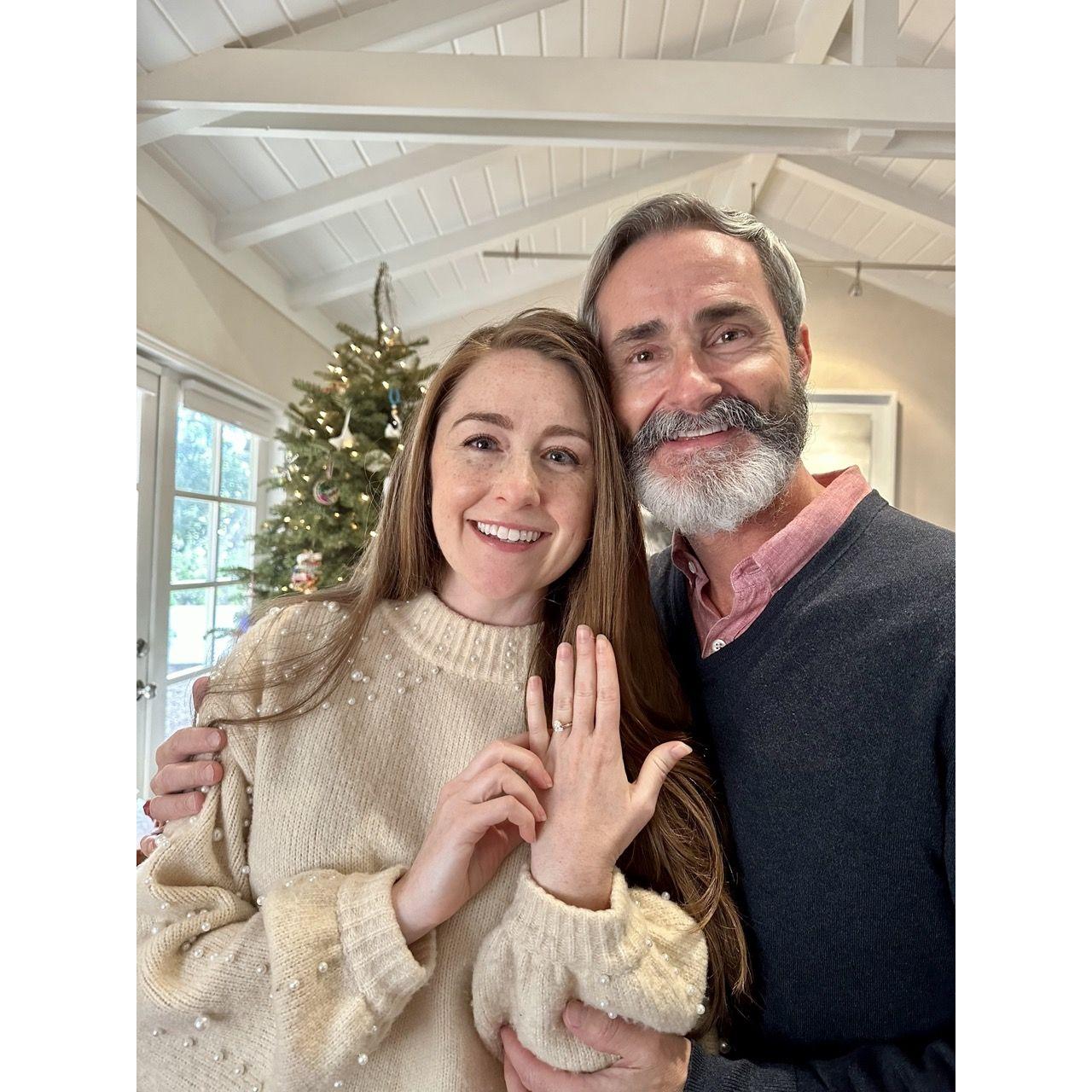 Robert proposed on Christmas Day 2023! Lillian (age 5.5) took this pic of us :)