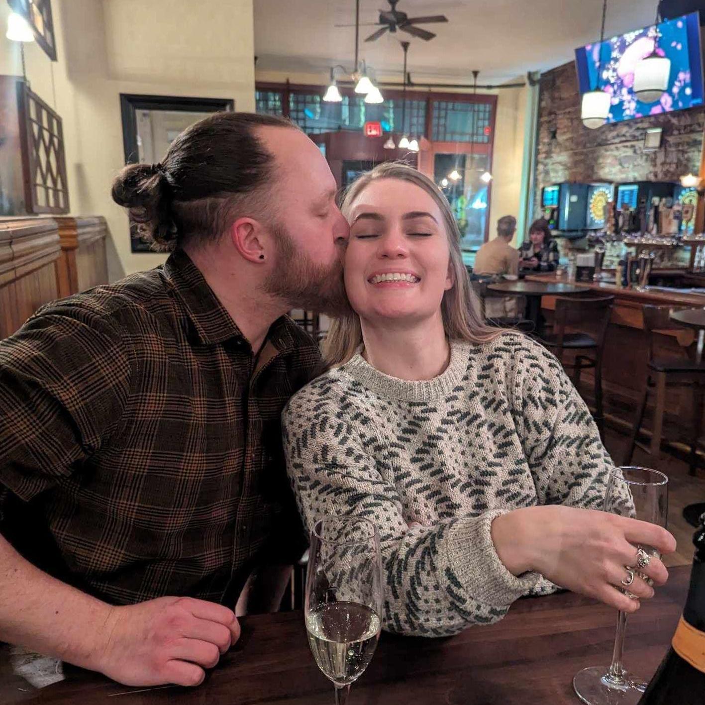 Post proposal champagne with friends in Potsdam, NY