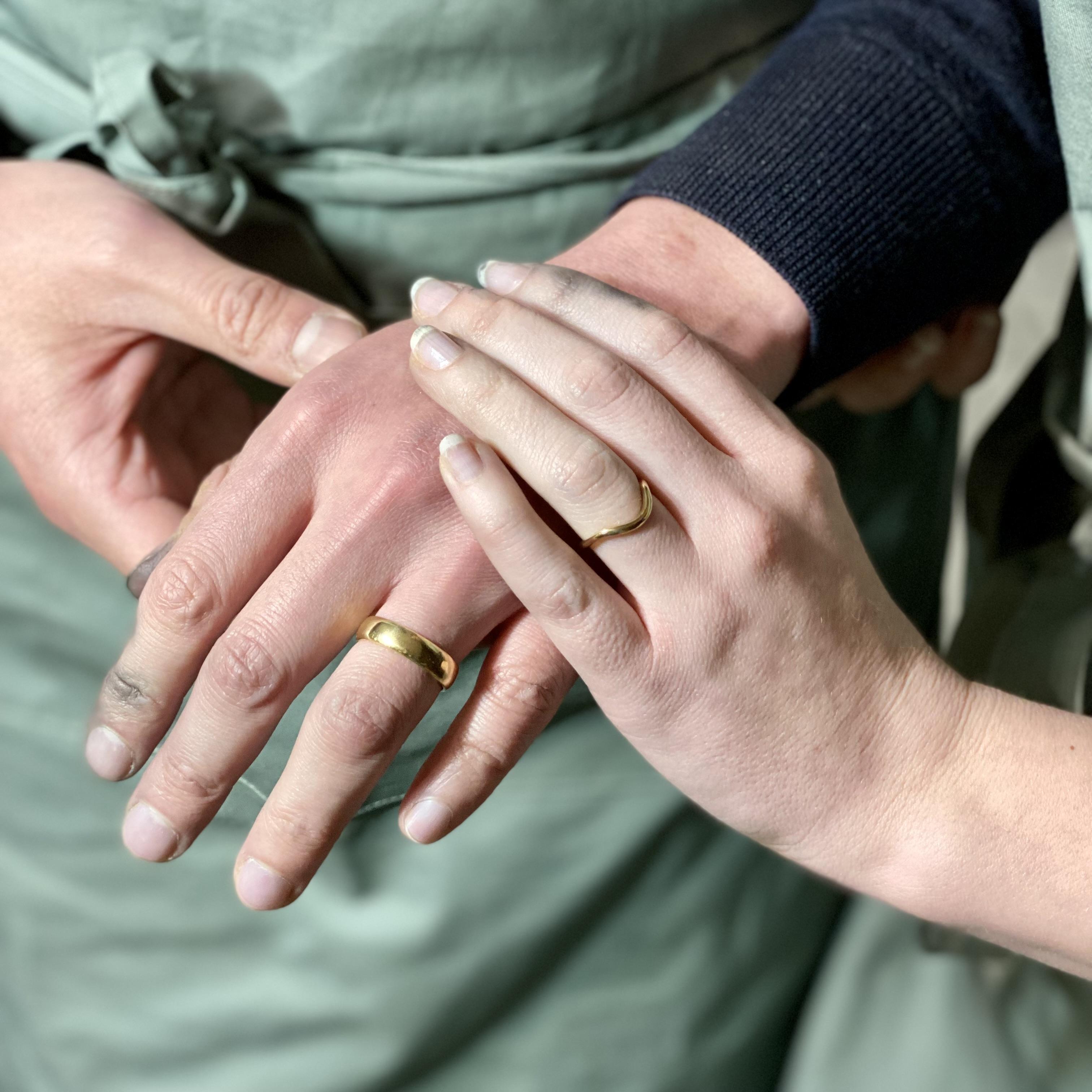 Admiring our handmade wedding rings.