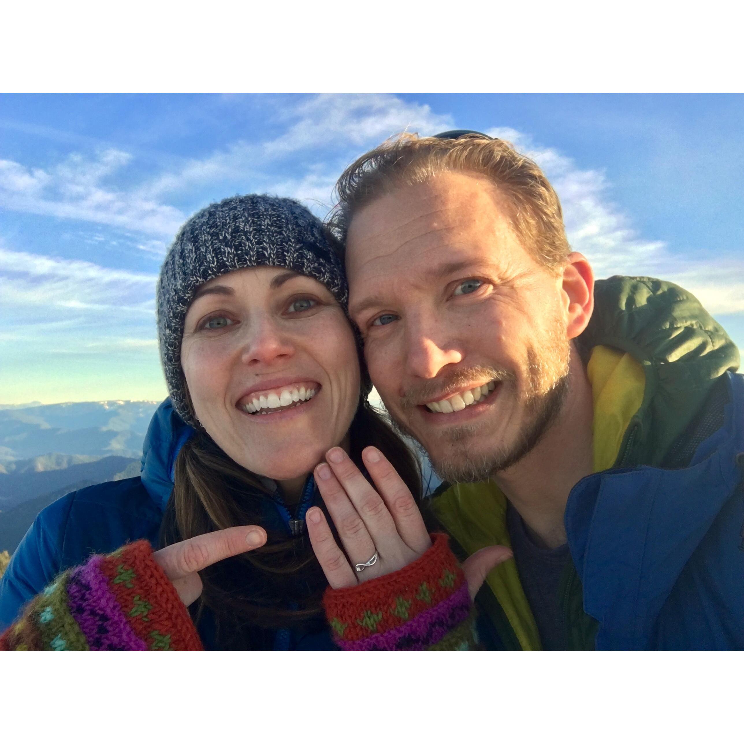 He proposed on top of a beautiful mountain on New Year's Day! I of course said YES!  #perfection