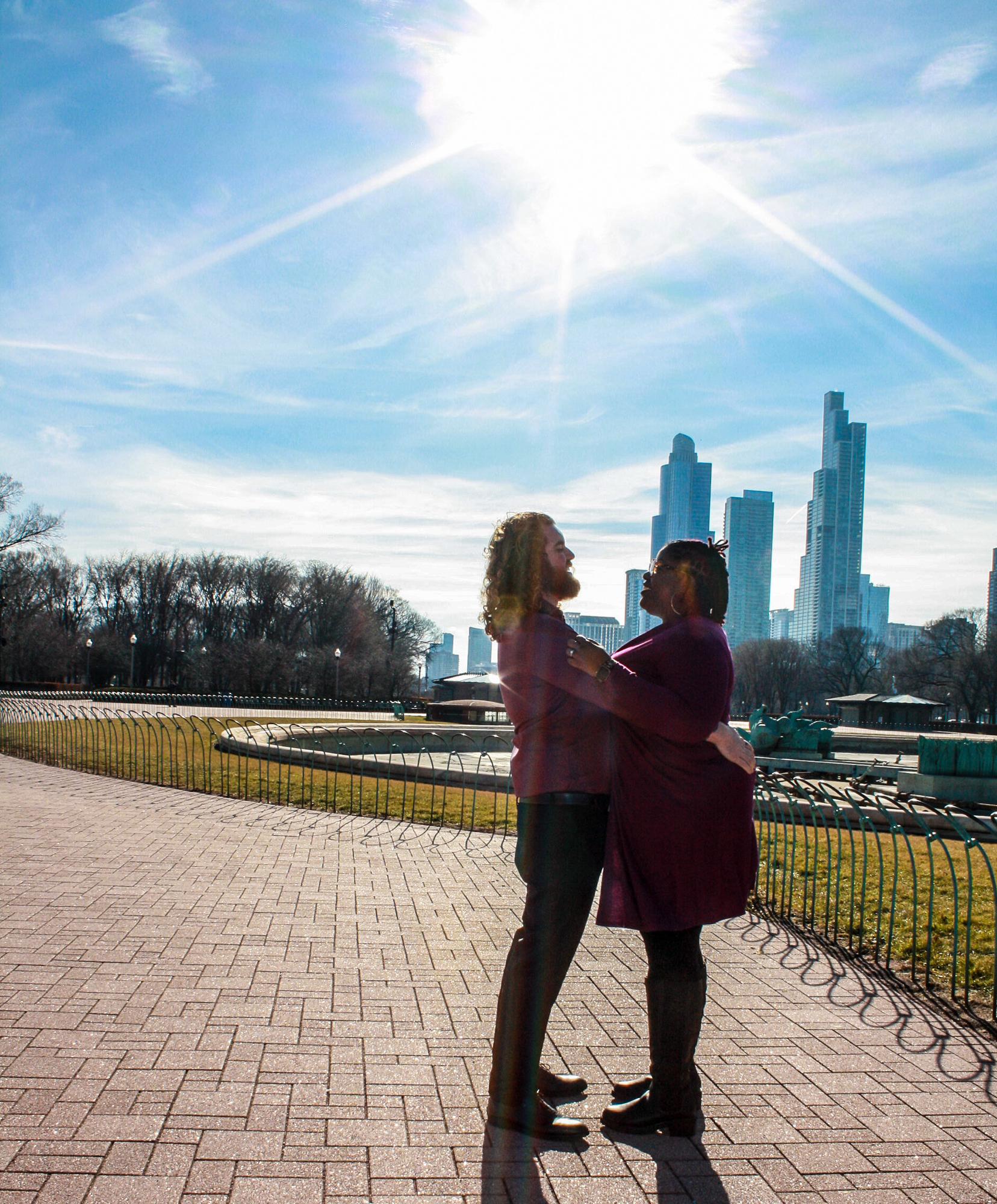 Engagement photos at Buckingham Fountain and along Lake Shore Drive— the artery of the city that connected us from the start.
