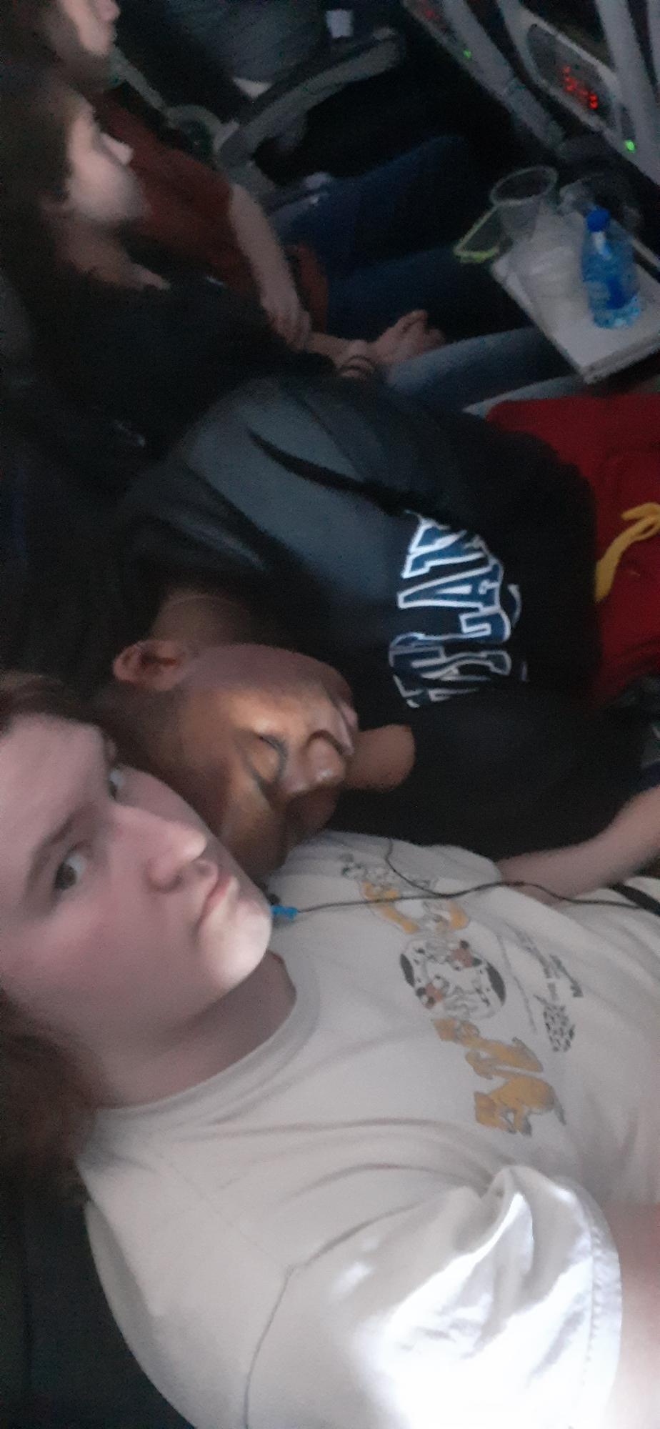 Gunner's sister snapped this picture of us on the plane! I was so exhausted and felt so safe and comfortable with him. He even gave me his hoodie to use as a blanket!
