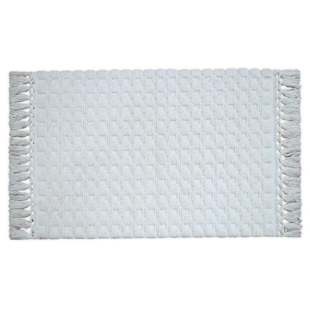 Bee & Willow™ Home 21" x 34" Sculpted Dot Bath Rug in Coconut Milk
