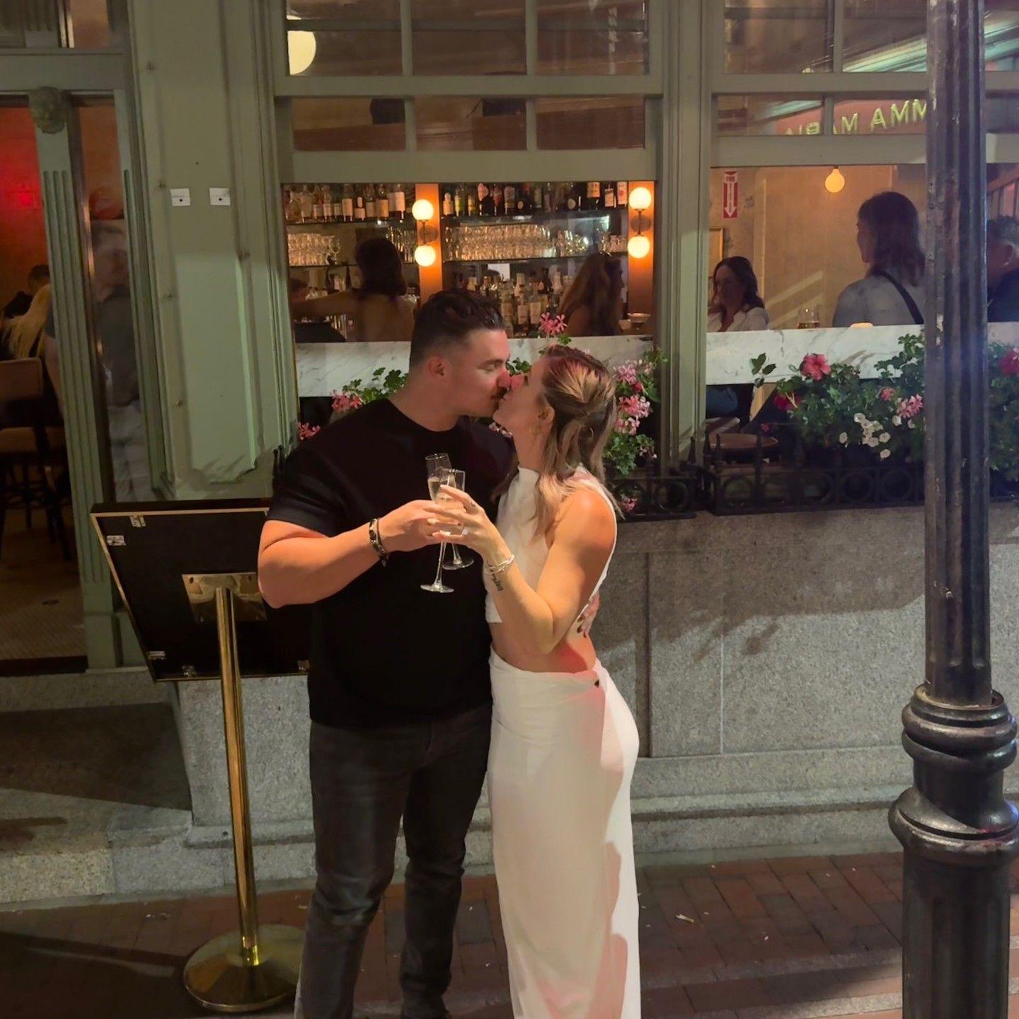 While onlookers sang 'That's Amore' out of the storefront windows