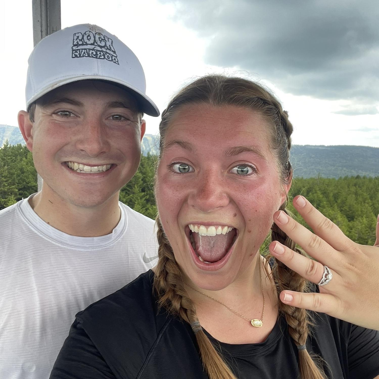8/31/2024 the day we got engaged. We went on a hike. At the top of the mountain there was a tower with a gorgeous view.