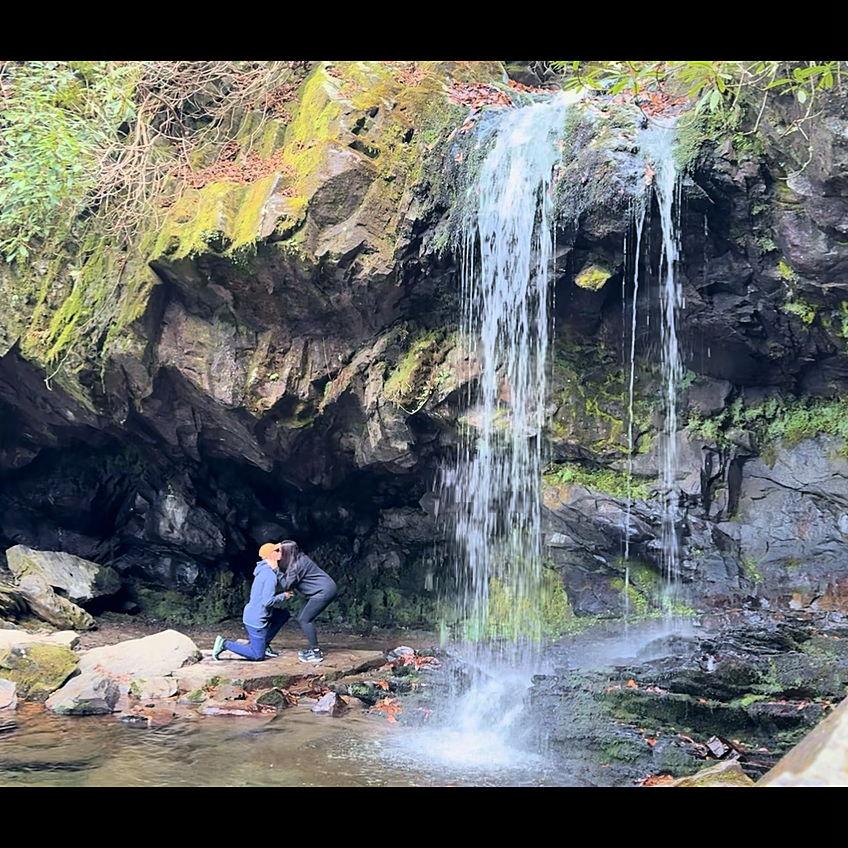 Tyler proposed on a weekend getaway trip in the Great Smoky Mountains in Gatlinburg, TN under a waterfall in November 2024!