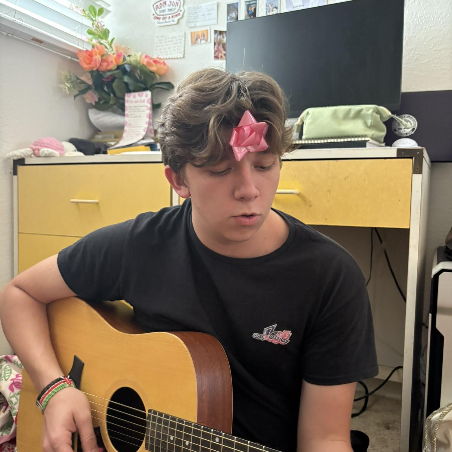 Jonah playing me a song!