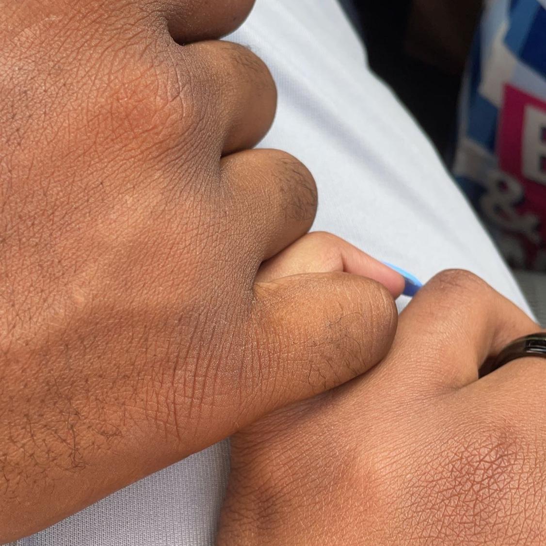 We always hold pinkies like this in the car