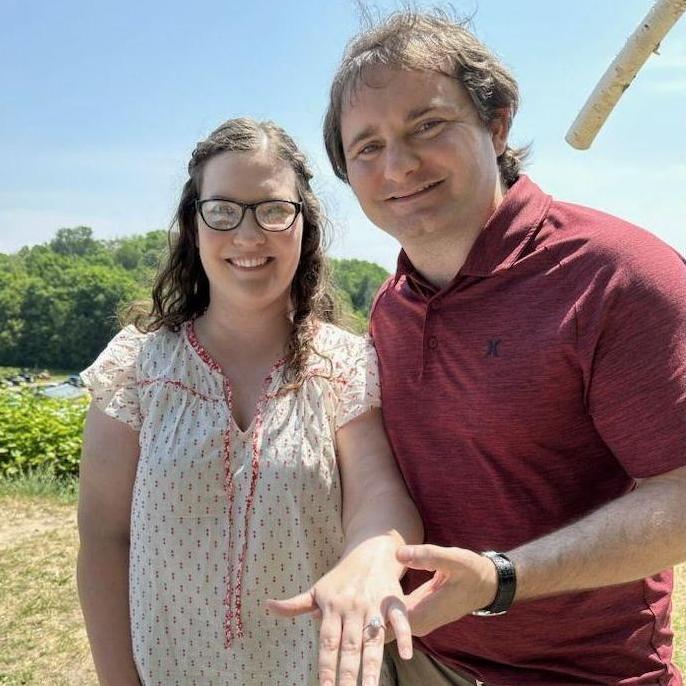 She said yes! at the top of the winery at Pond Hill Farm in Harbor Springs, Michigan July 2023