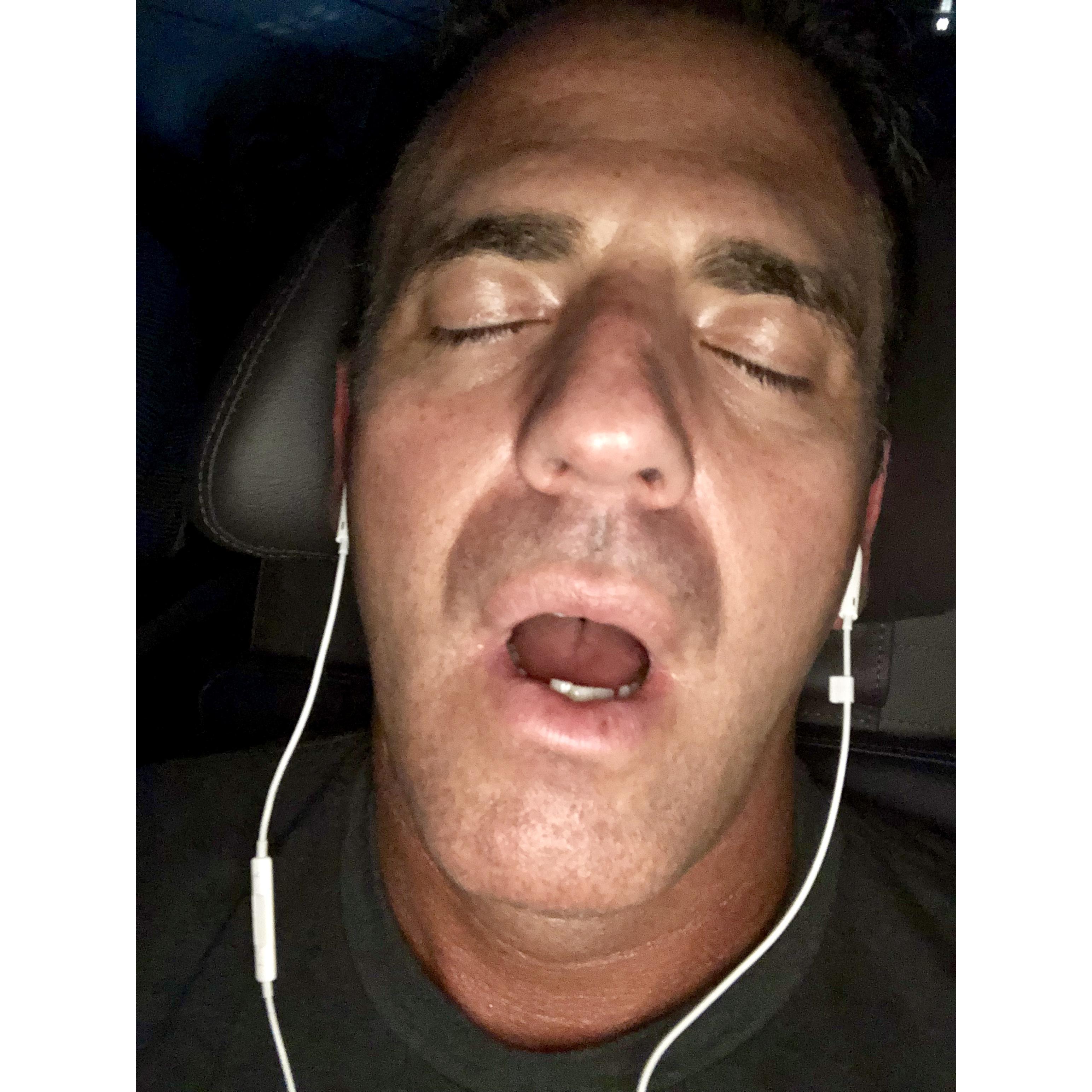 How we entertain ourselves on long trips- he loses a lot, can't remember what trip this is from, but it's one of MANY photos