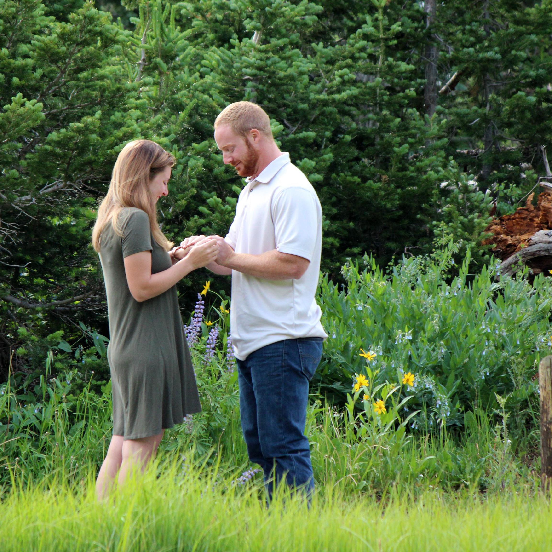 Putting the ring on.