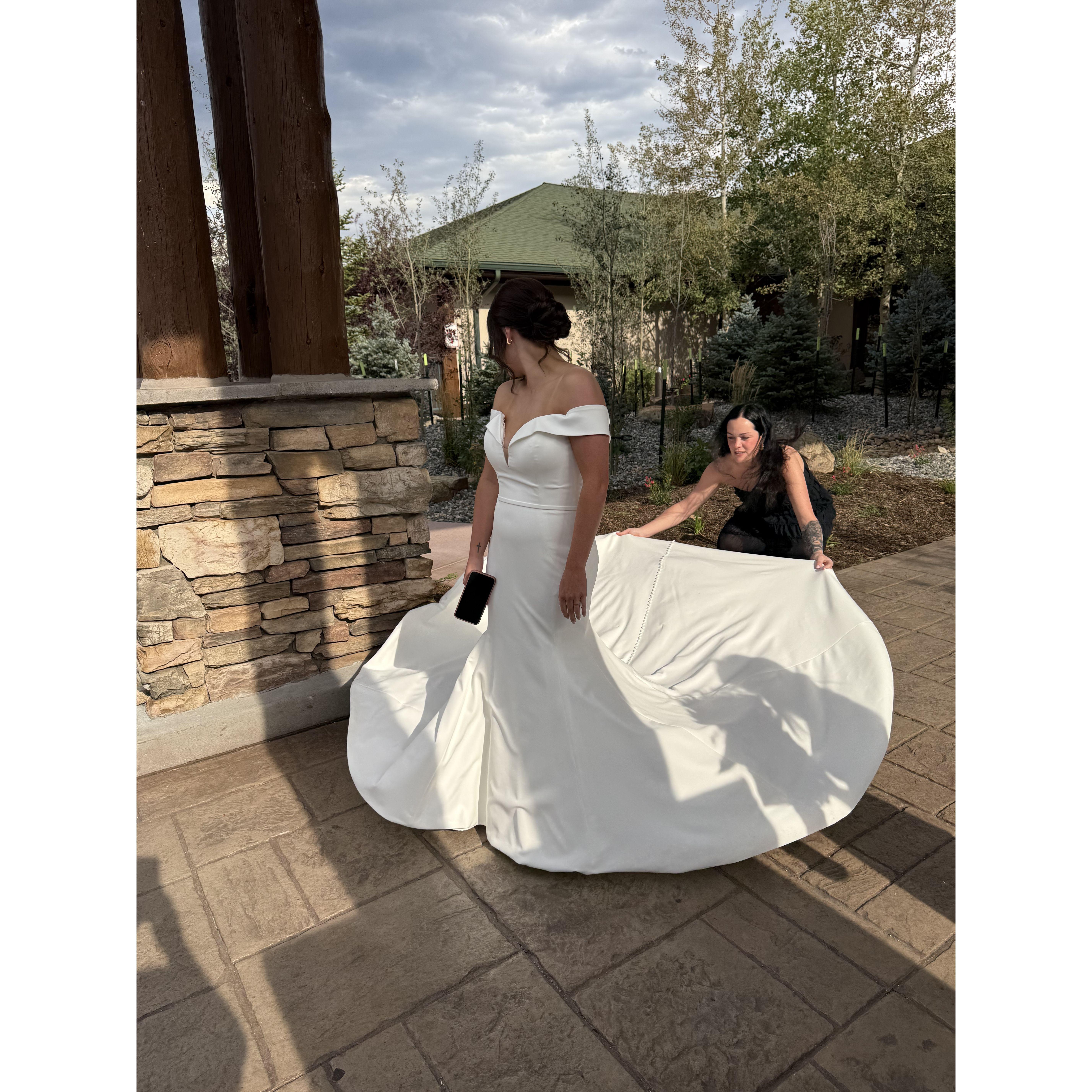 My queen fluffing the dress for pics