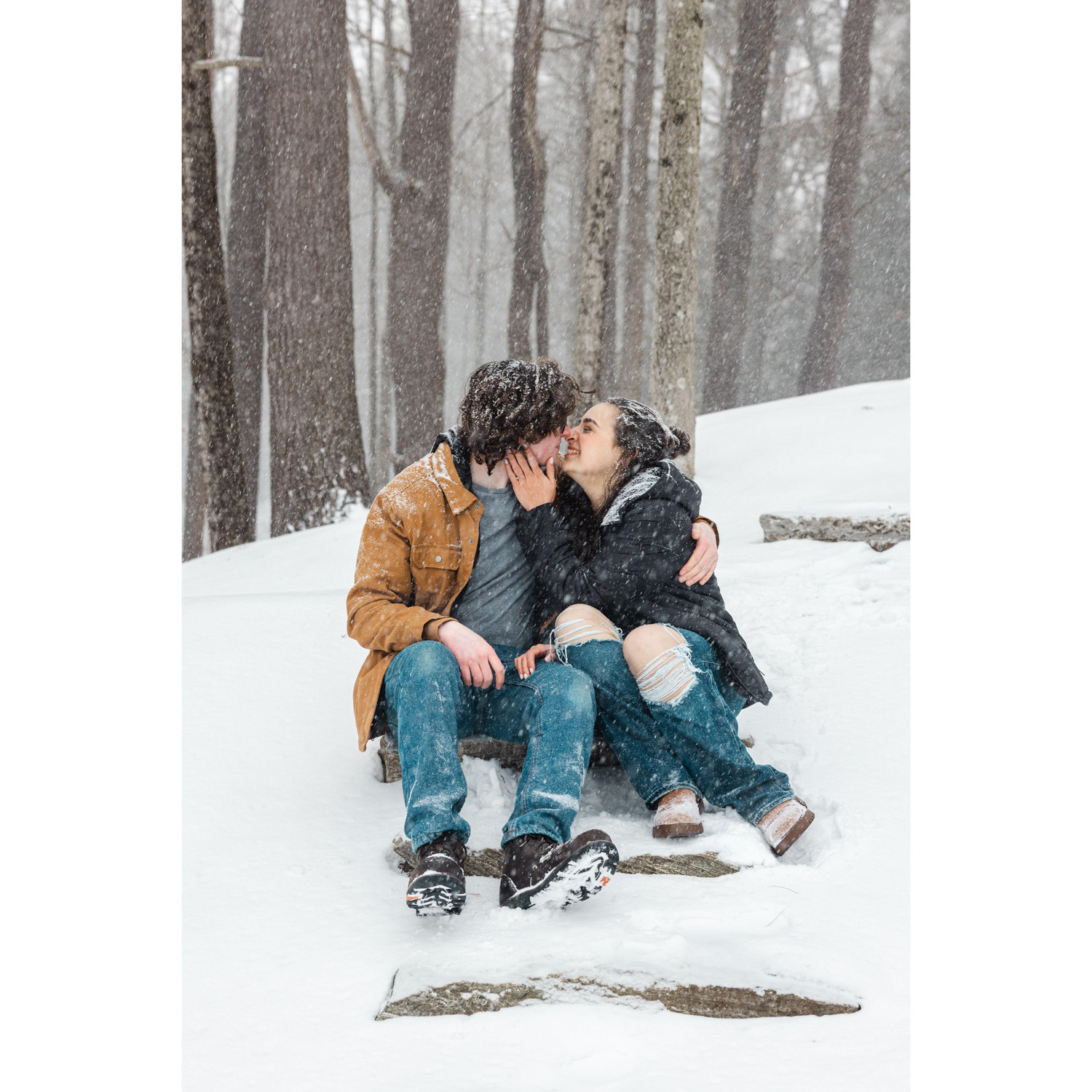 From our snowy engagement session with our wedding photographer (Caitlin Miller Photography) during the biggest storm that season!