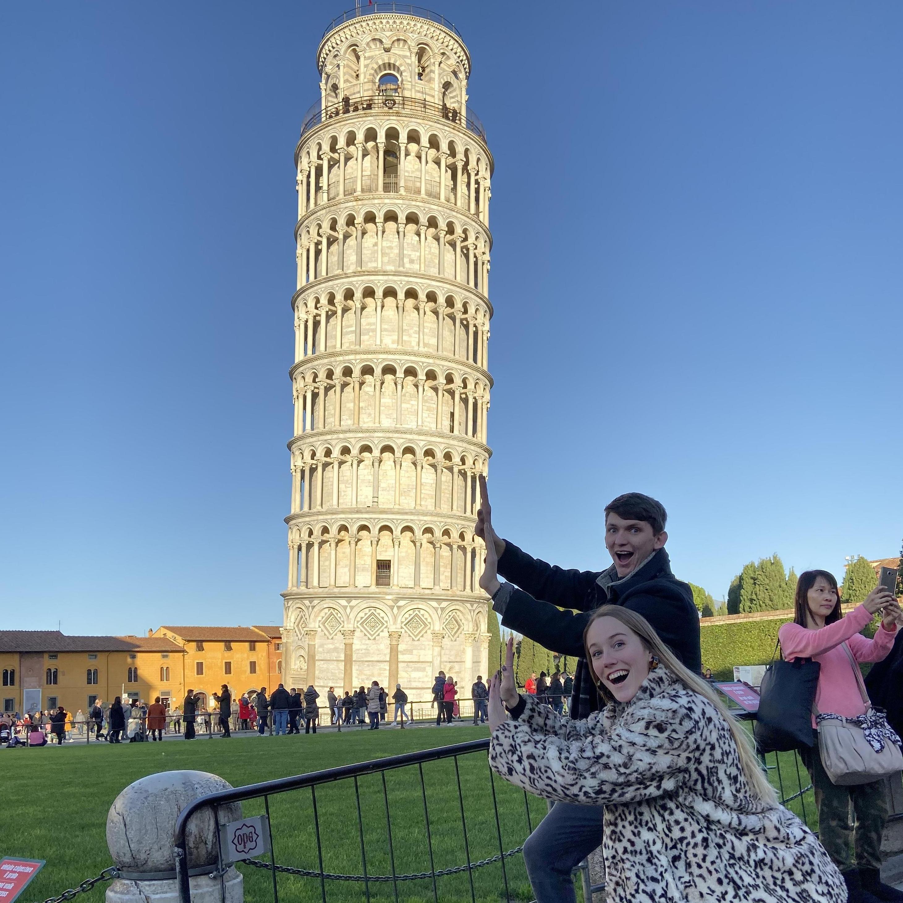 Holding up the leaning tower of Pisa on our Europe trip in December 2019!