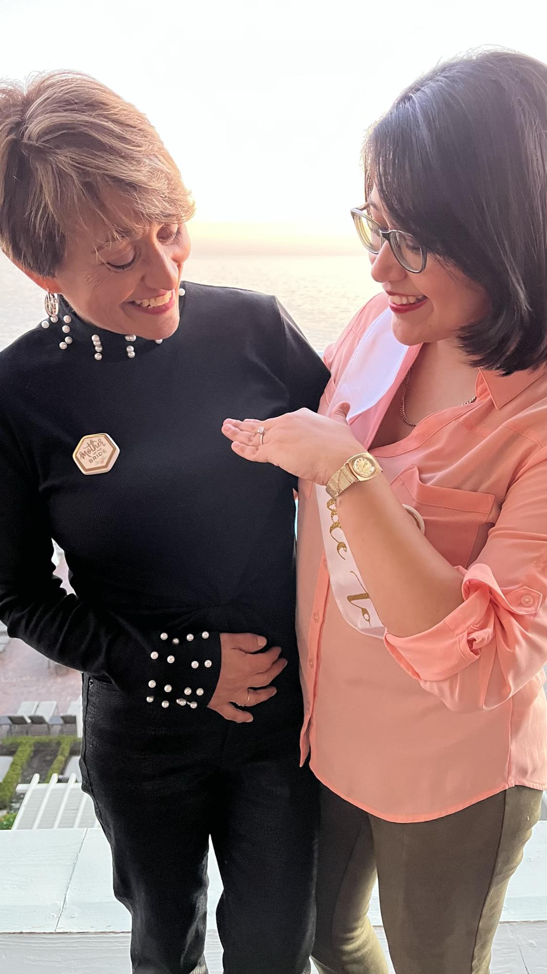 Mother of the Bride admiring the bling