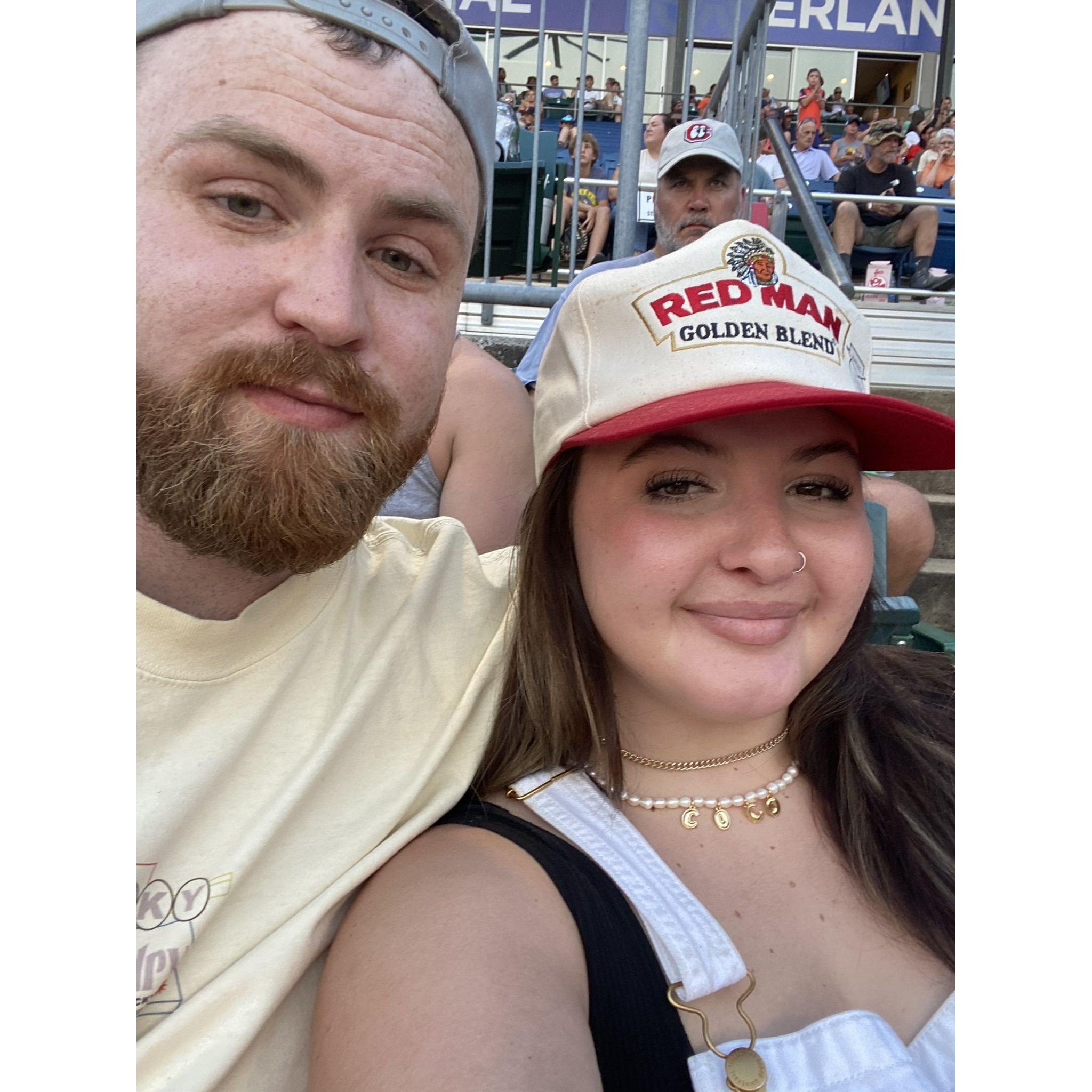 Lookouts game a few weeks after we started dating. It was a work event for Waste Connections so I got to meet a lot of his co-workers!