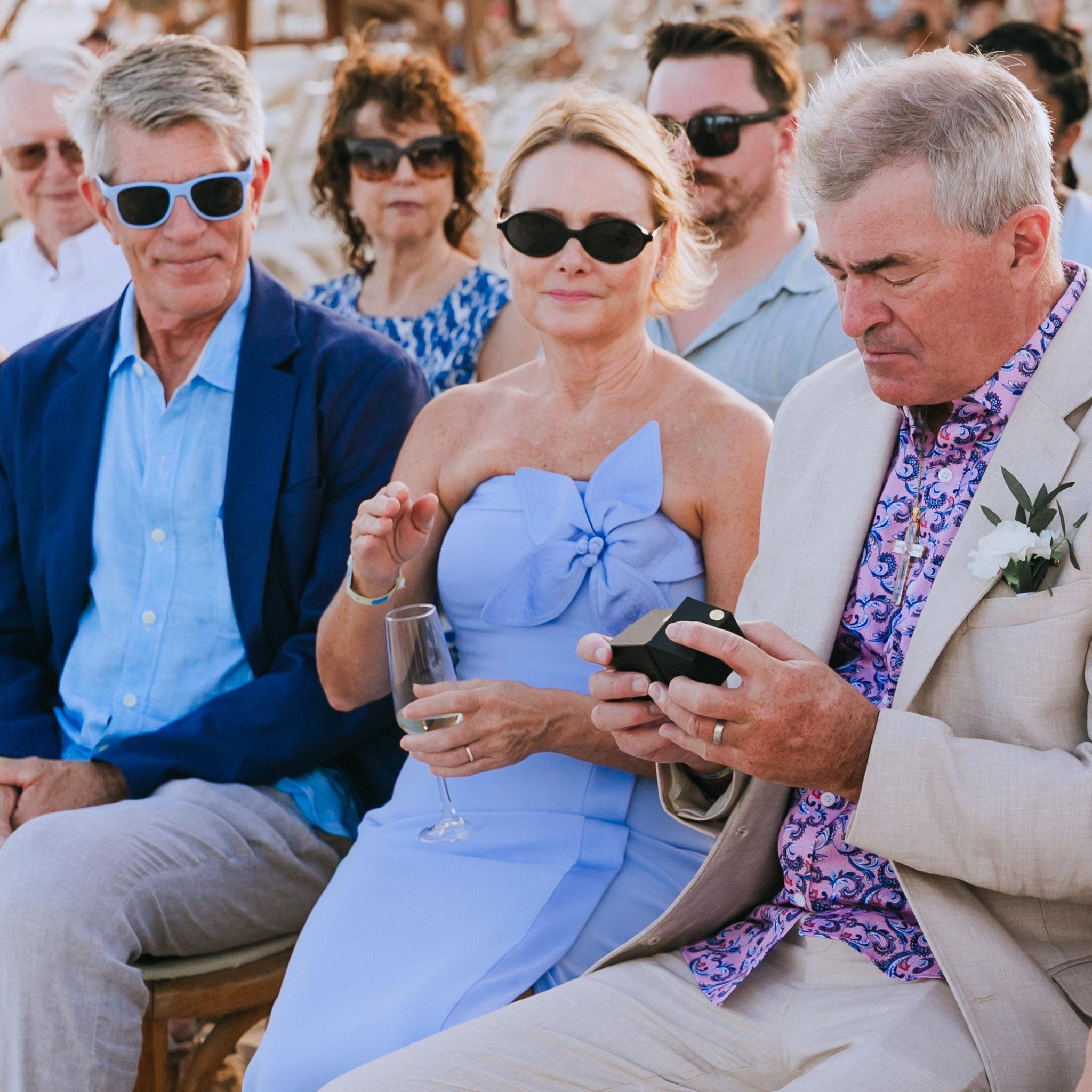 We asked our family members to hold and bless our rings during our wedding ceremony.
