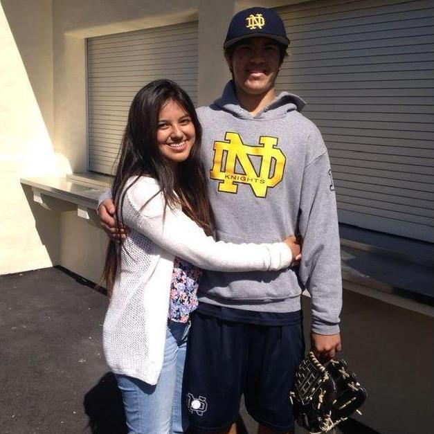 Check out our first photo together in 2014! Our love story (technically) started at our alma mater, Notre Dame High School. Everly was beginning her freshman year and stopped by Jack's baseball game.