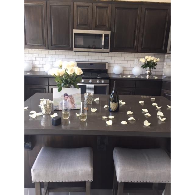 It wasn't until I seen the Mr. and Mrs. champagne glasses that I KNEW for SURE he was proposing!