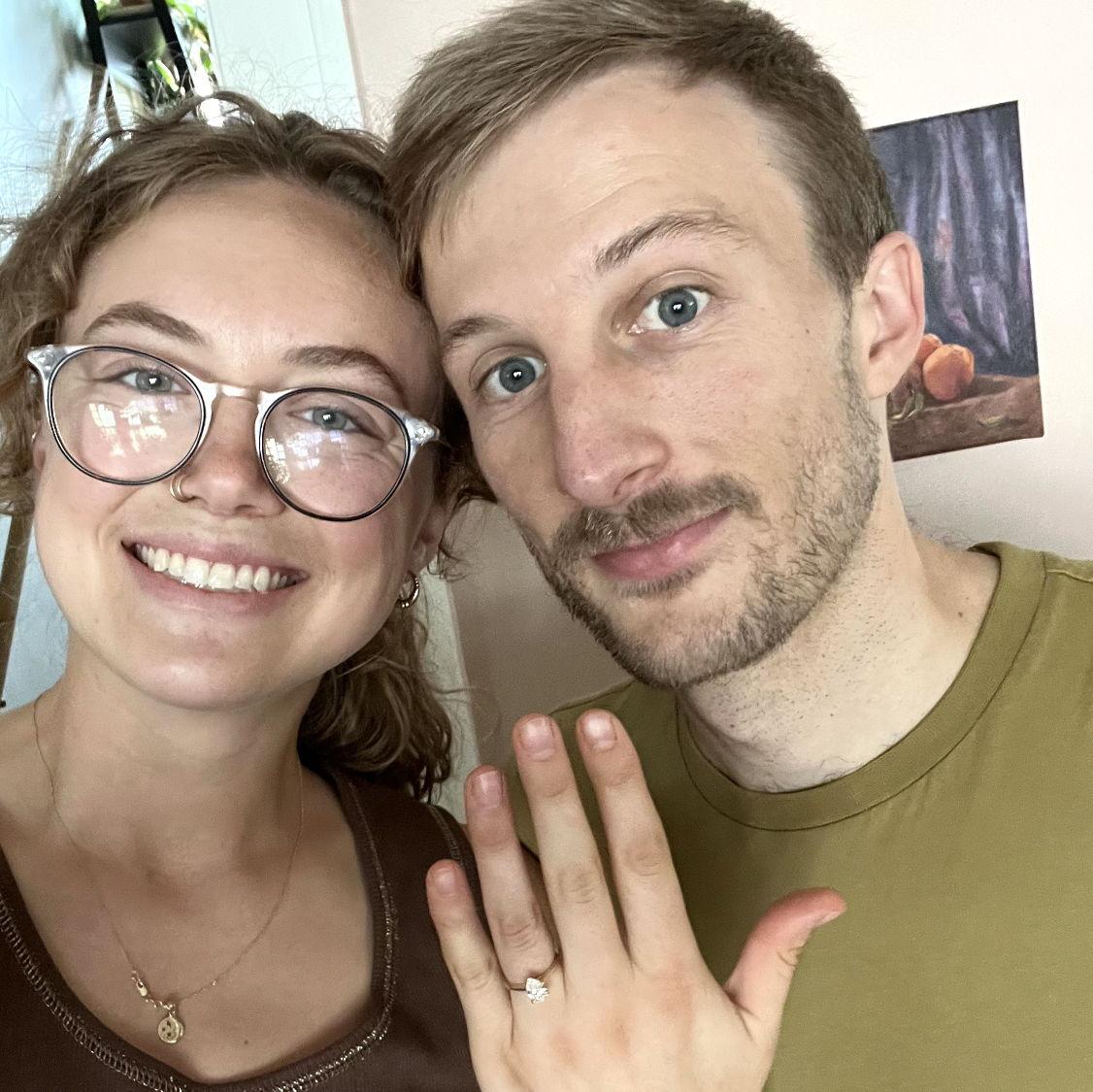 Engaged in our living room.. after an at home date night