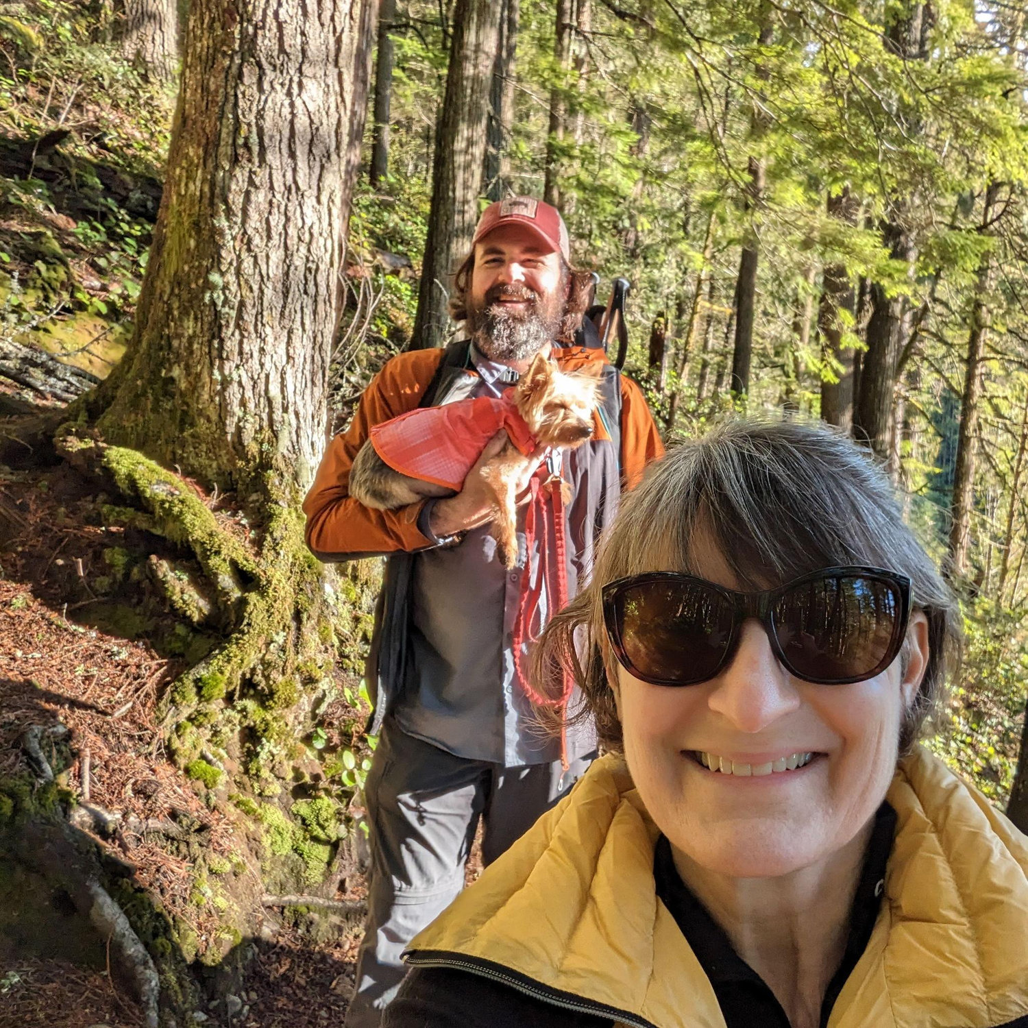 Helping Aspen on a hike