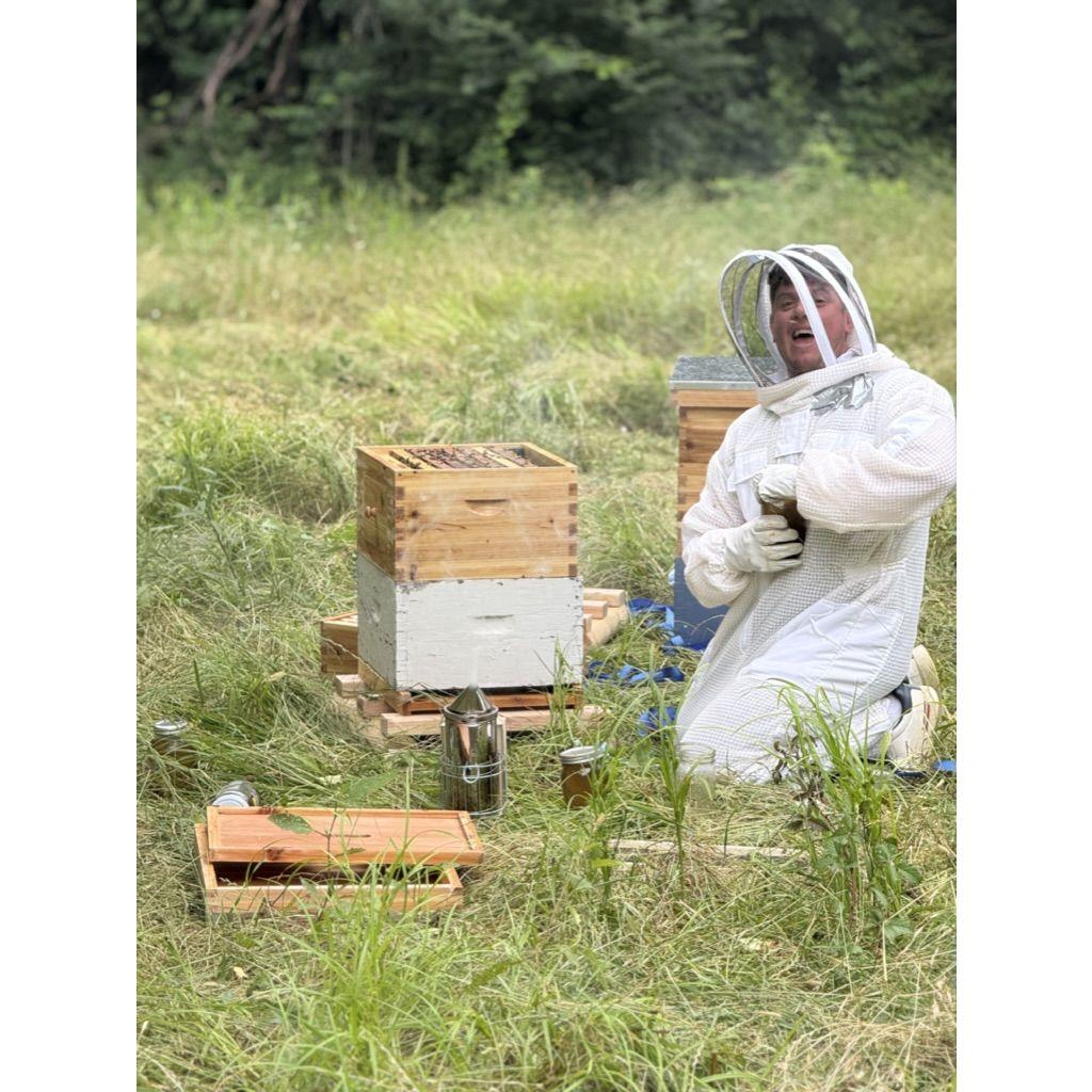 Putting the bees on our new land!