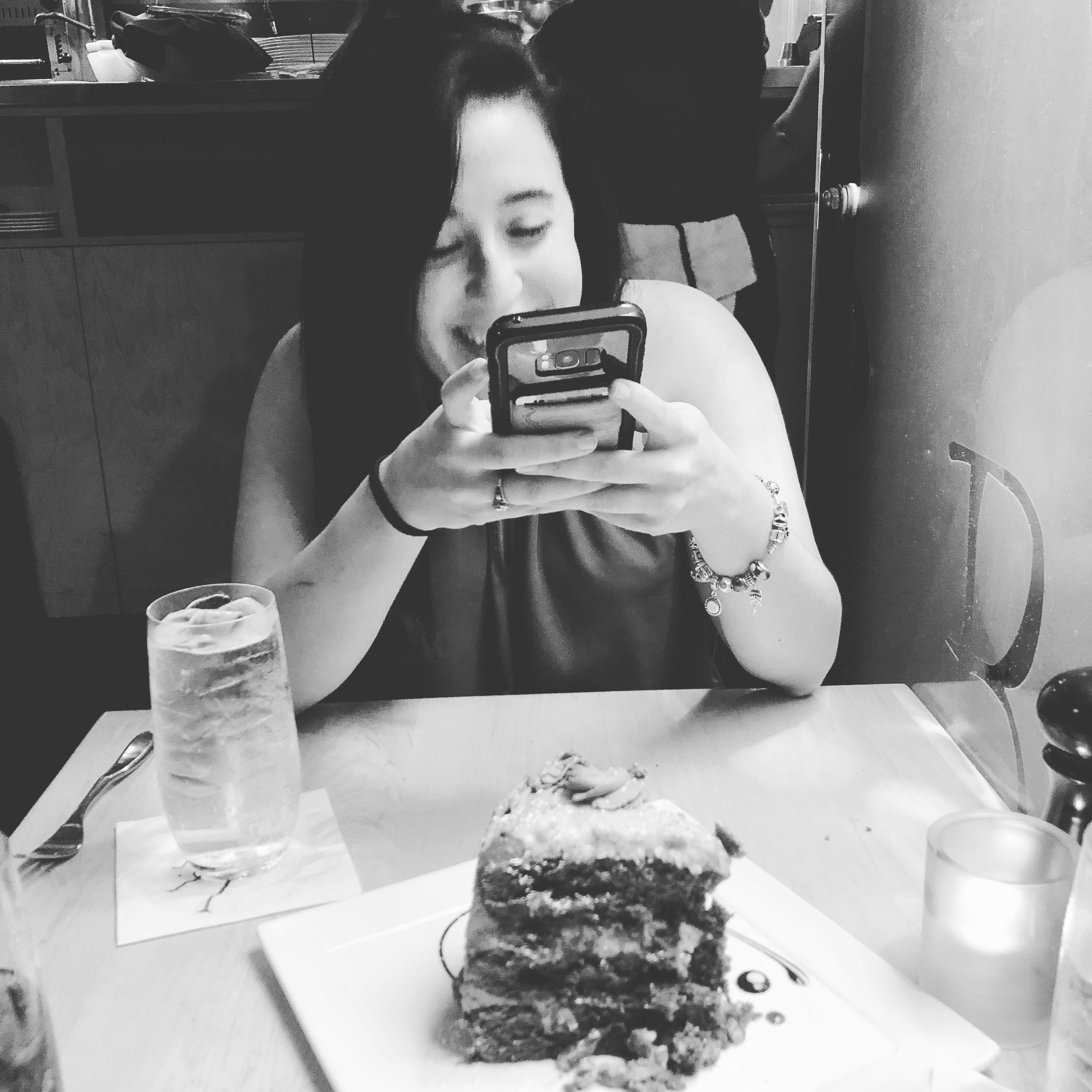 While she was looking at the beautiful cake, I was looking at the beautiful girl