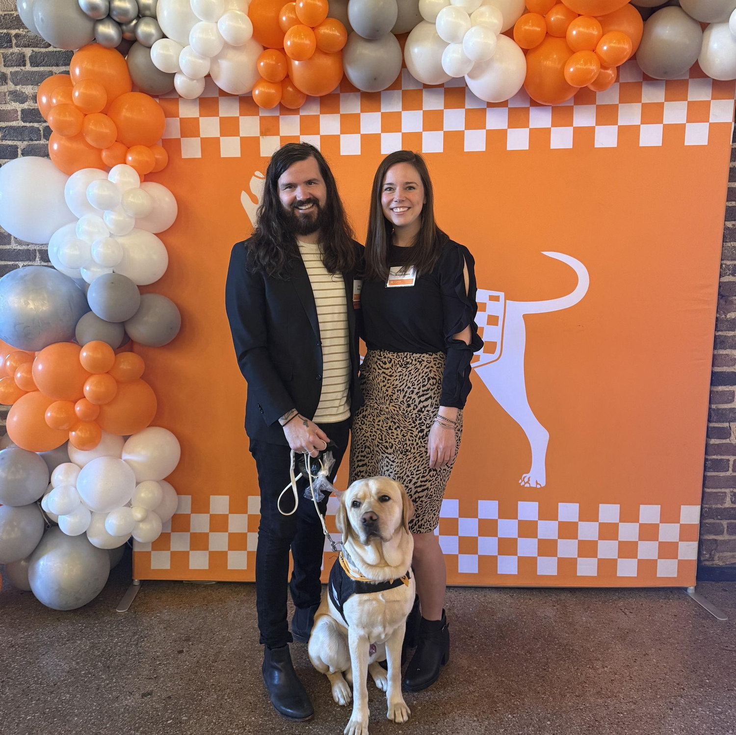 February 2025 - University of Tennessee's 40 Under 40 Awards with Bill (who was in training with Warrior Canine Connection)