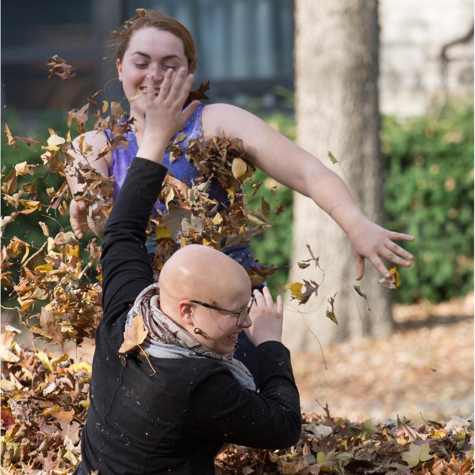 Sophomore year I convinced her to play in a leaf pile with me, and a stranger thought we were cute so he took some photos and sent them to me.